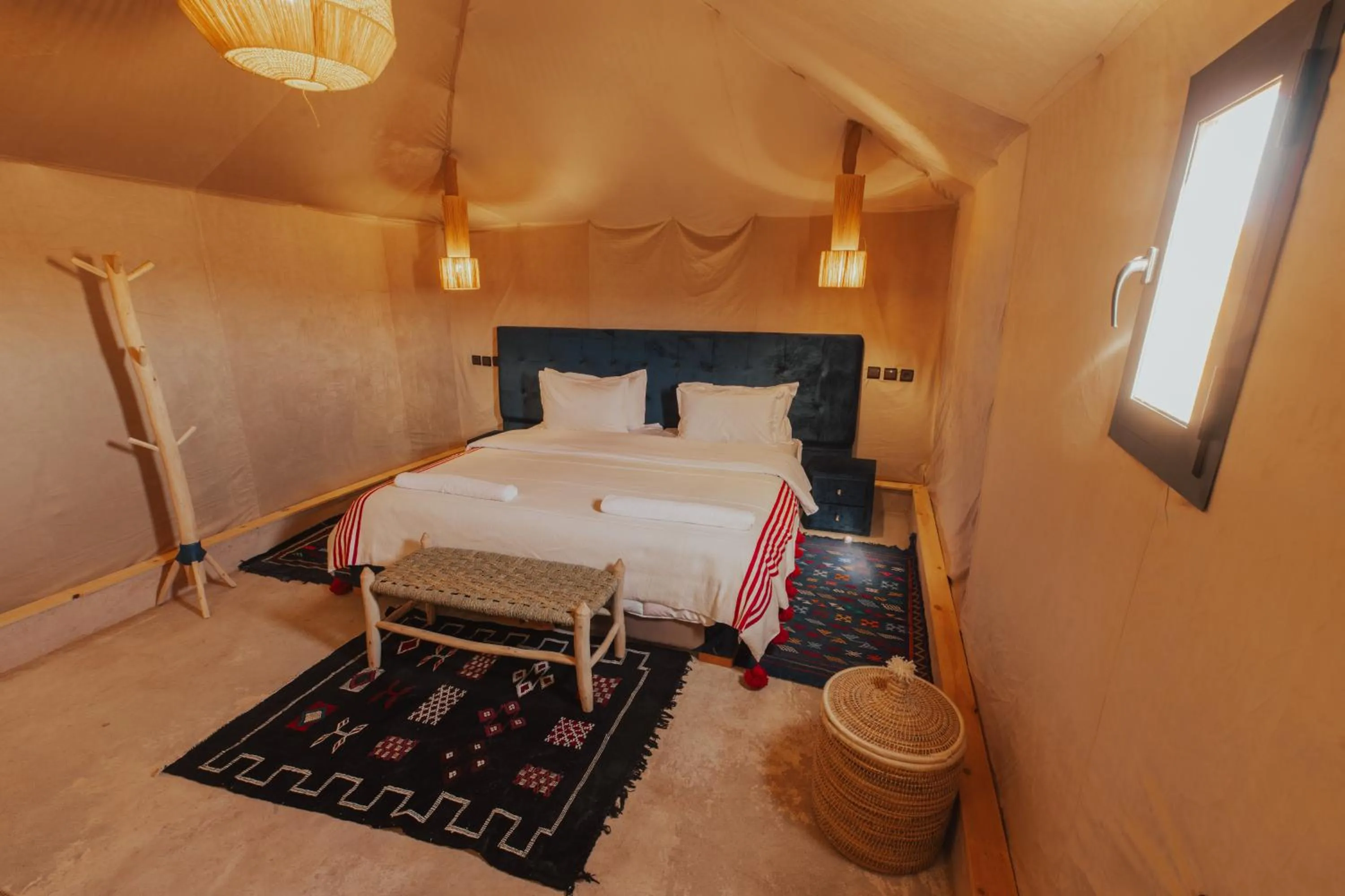 Bed in Tassili Luxury Desert Camp