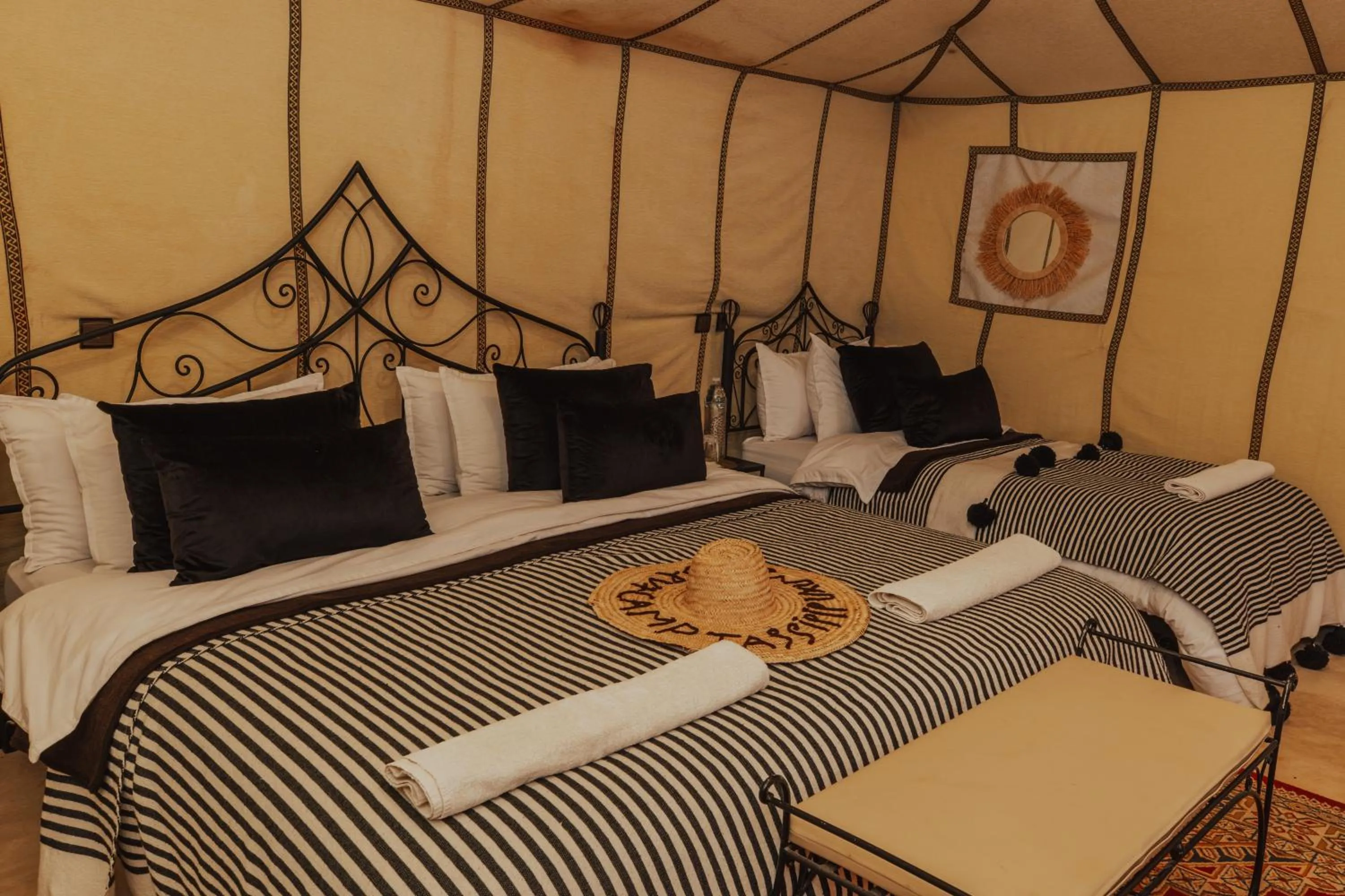 Bed in Tassili Luxury Desert Camp