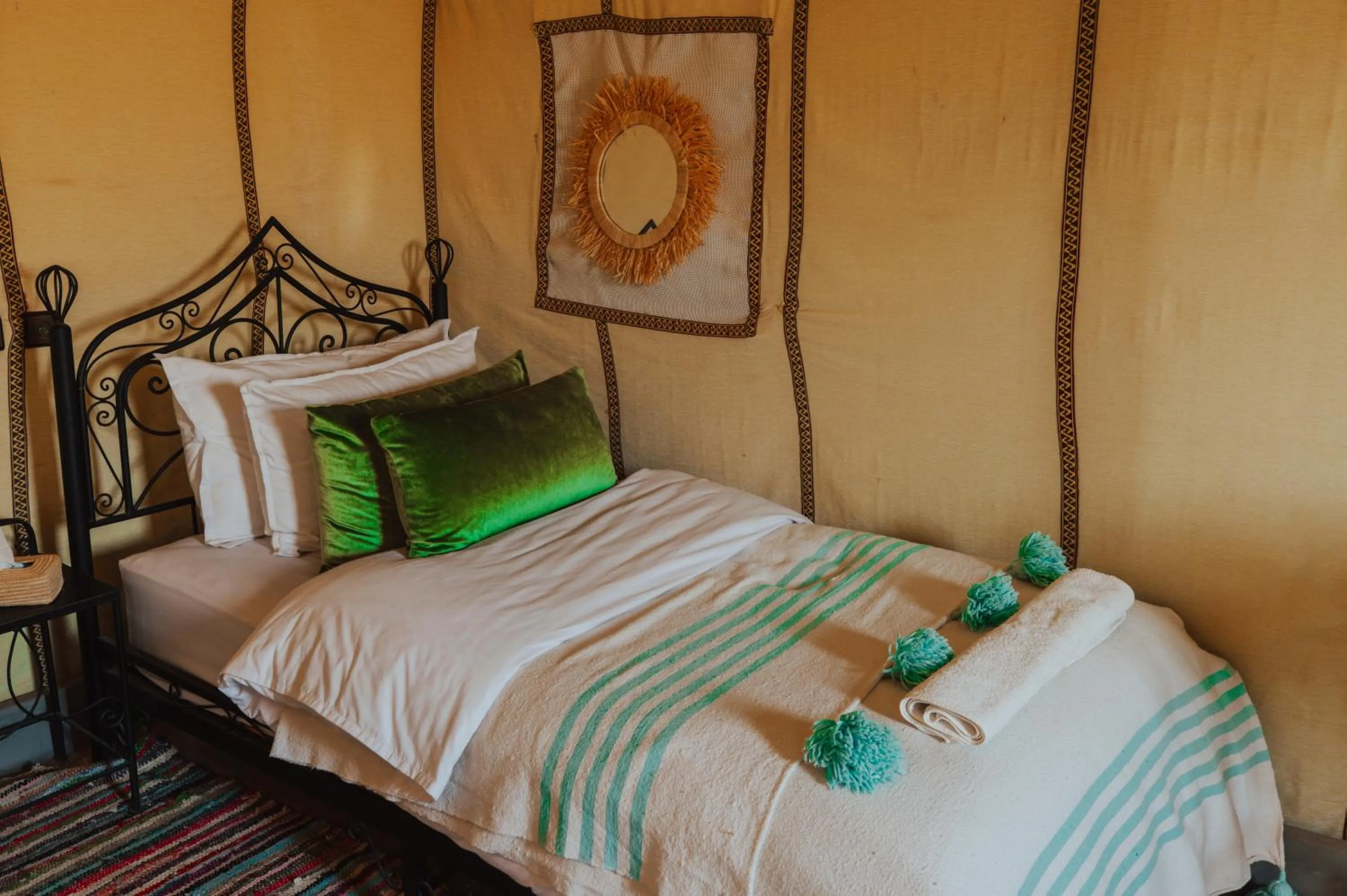 Bed in Tassili Luxury Desert Camp