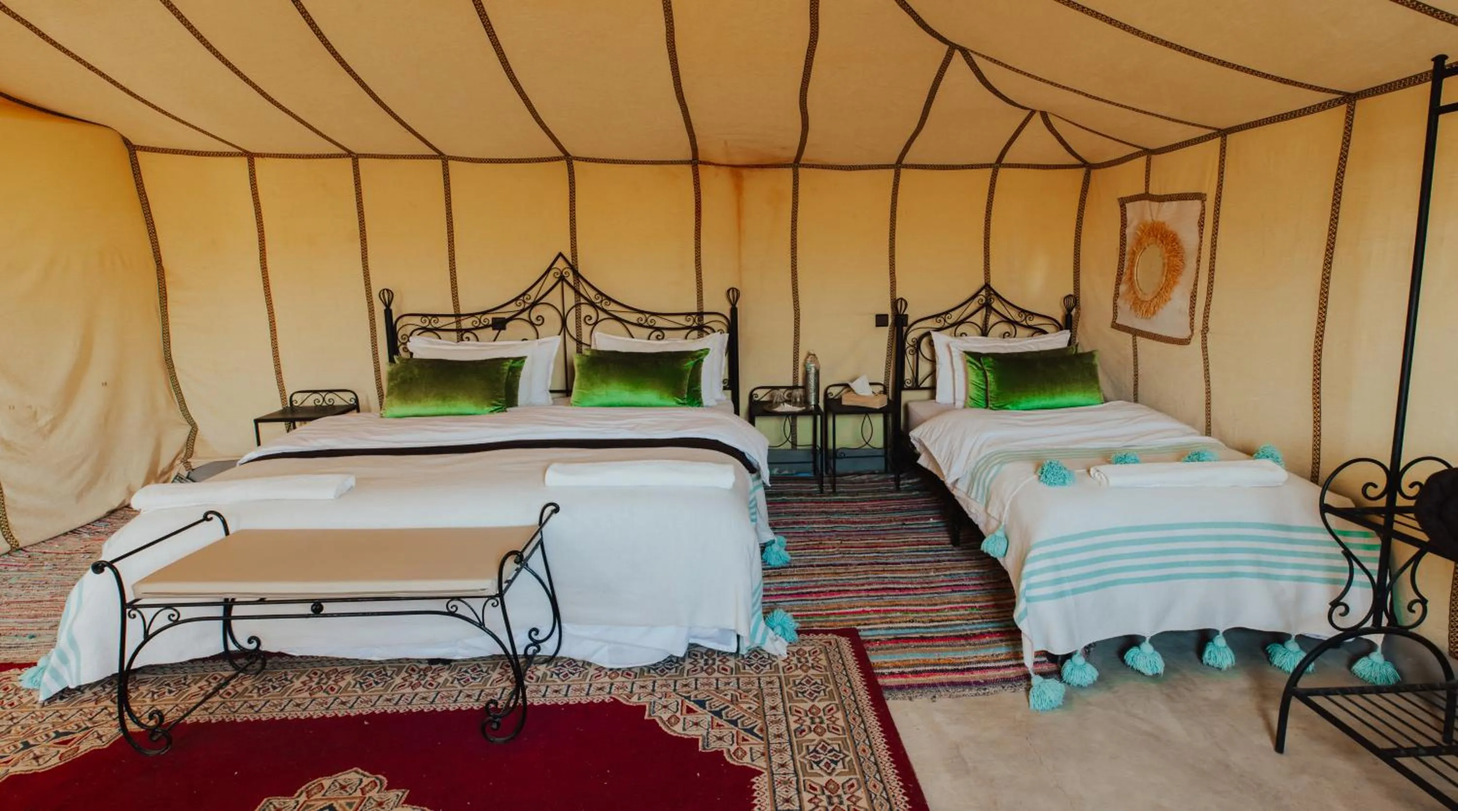 Bed in Tassili Luxury Desert Camp