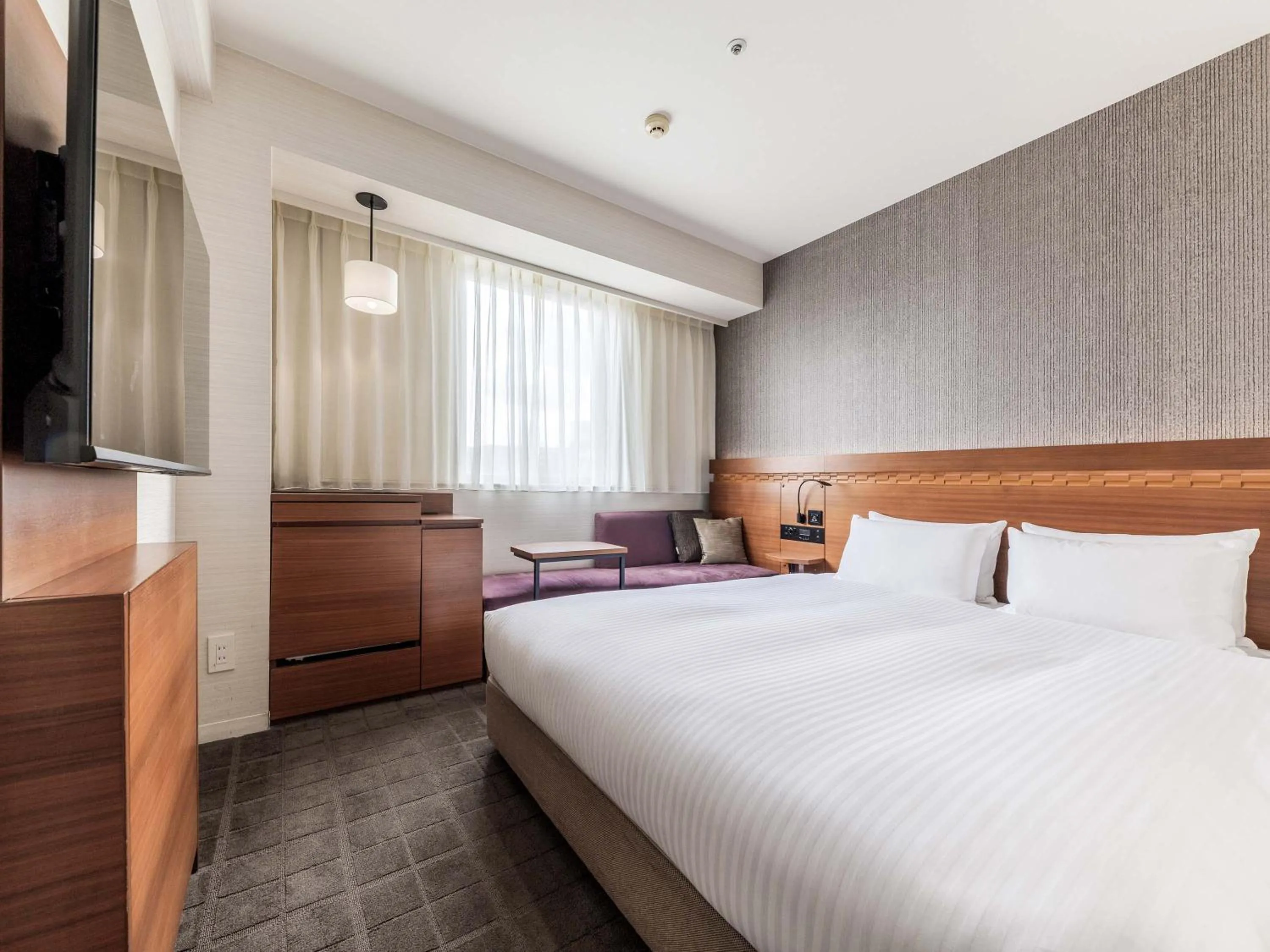 Bed in Nishitetsu Hotel Croom Hakata