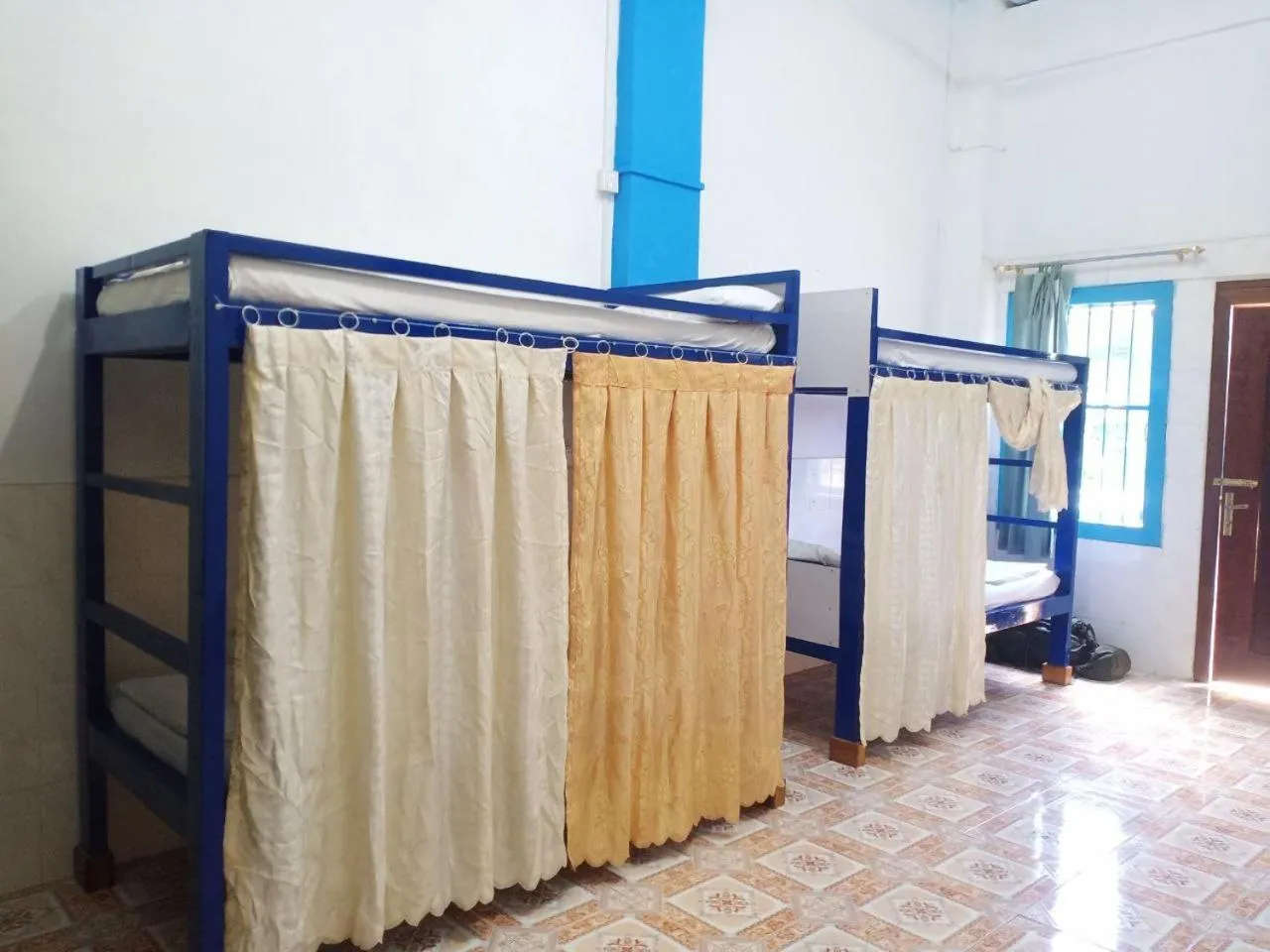 Bed in Silver Dolphin Guesthouse & Restaurant