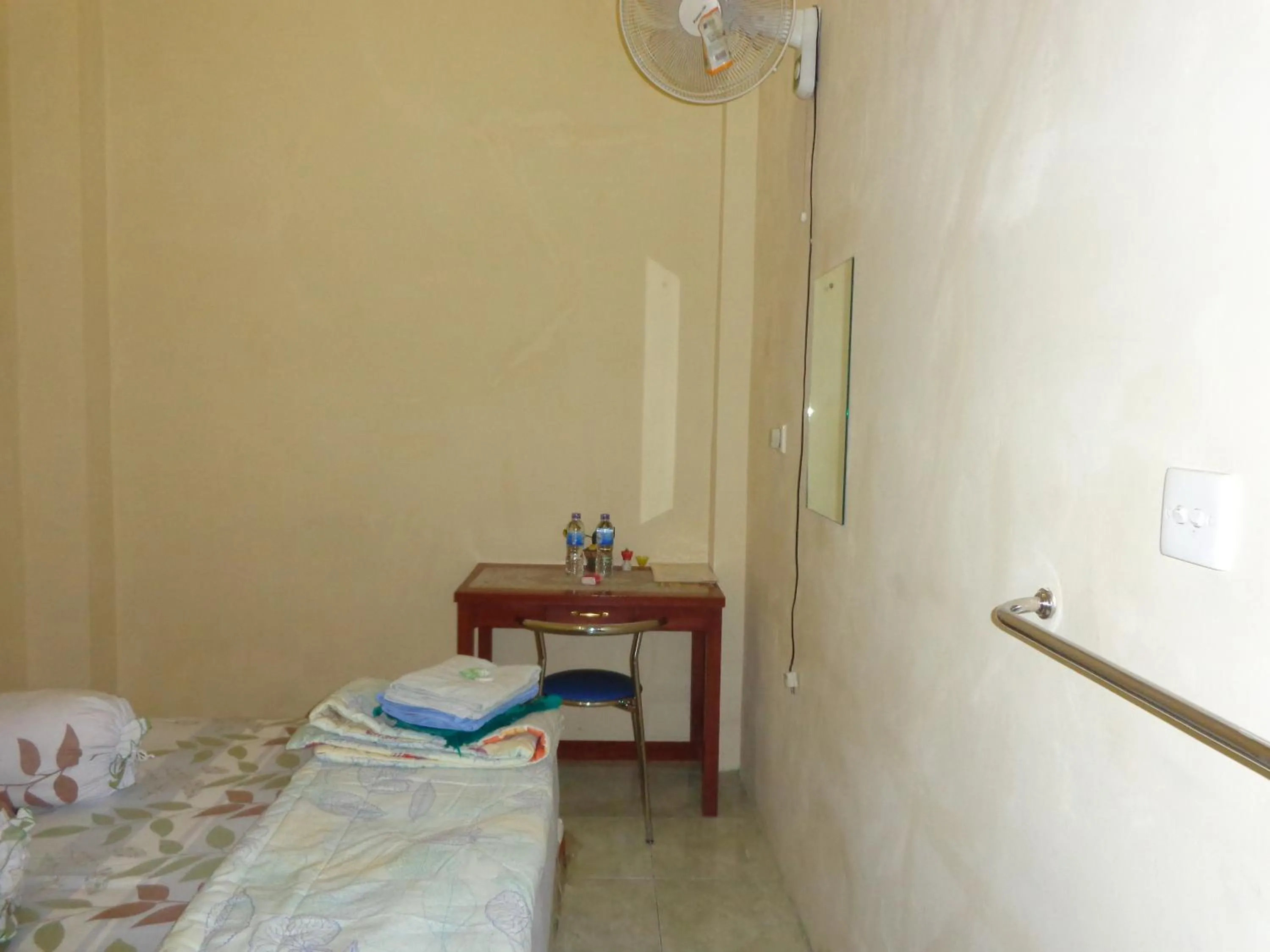 Bed in Hotel Musafir Inn