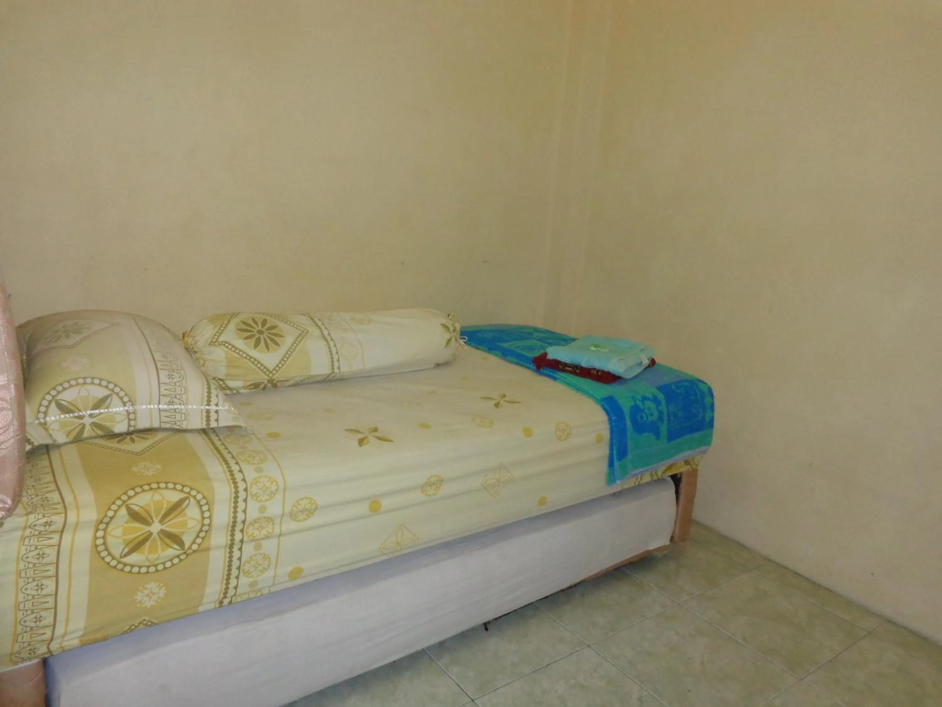 Bed in Hotel Musafir Inn