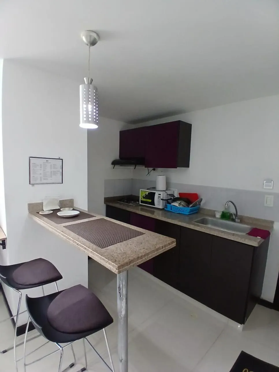 Kitchen or kitchenette in Hotel Plaza Norte Cali