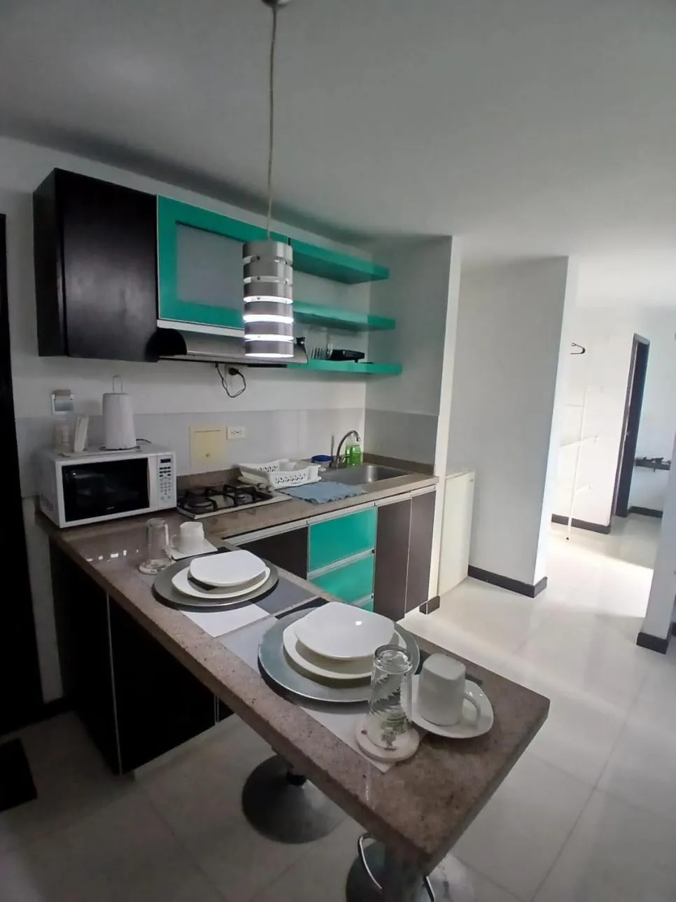 Kitchen or kitchenette in Hotel Plaza Norte Cali