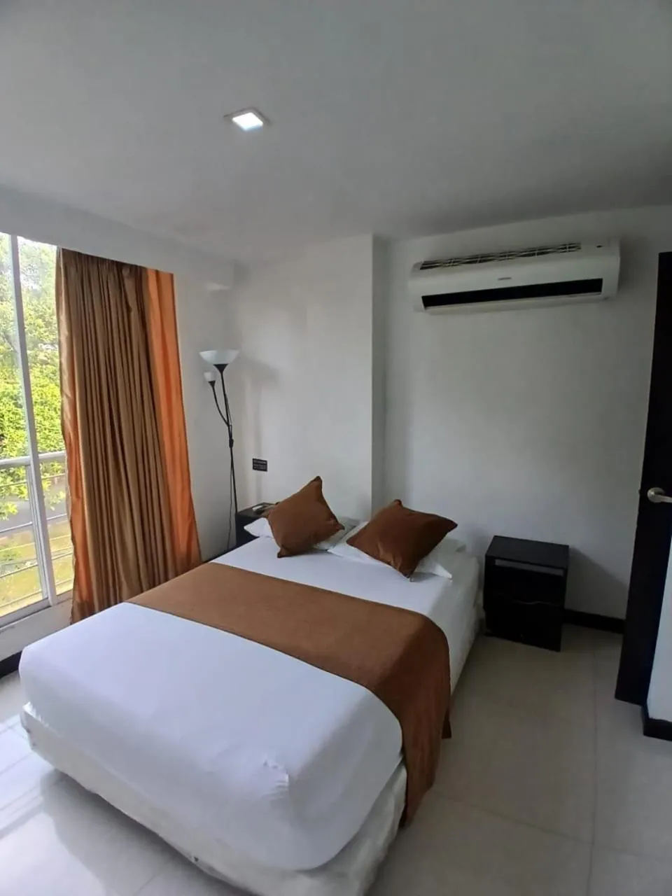 Photo of the whole room, Bed in Hotel Plaza Norte Cali