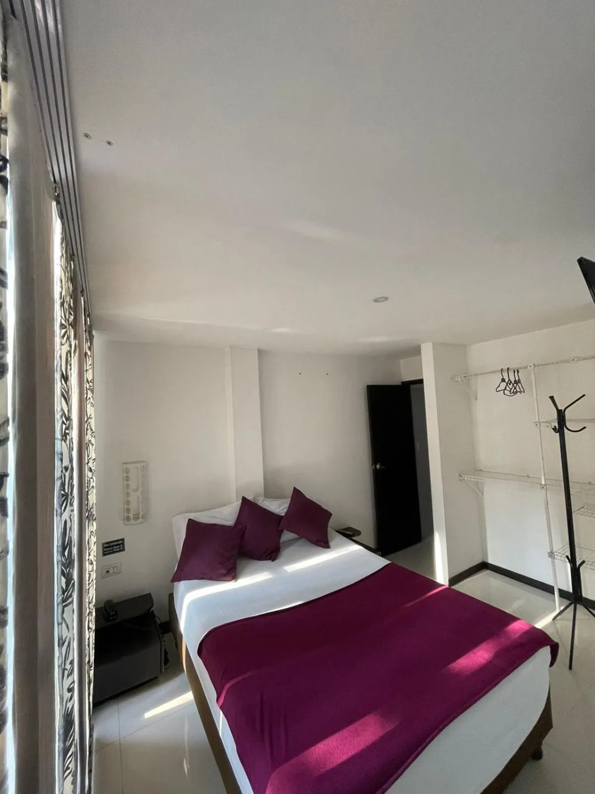 Photo of the whole room, Bed in Hotel Plaza Norte Cali