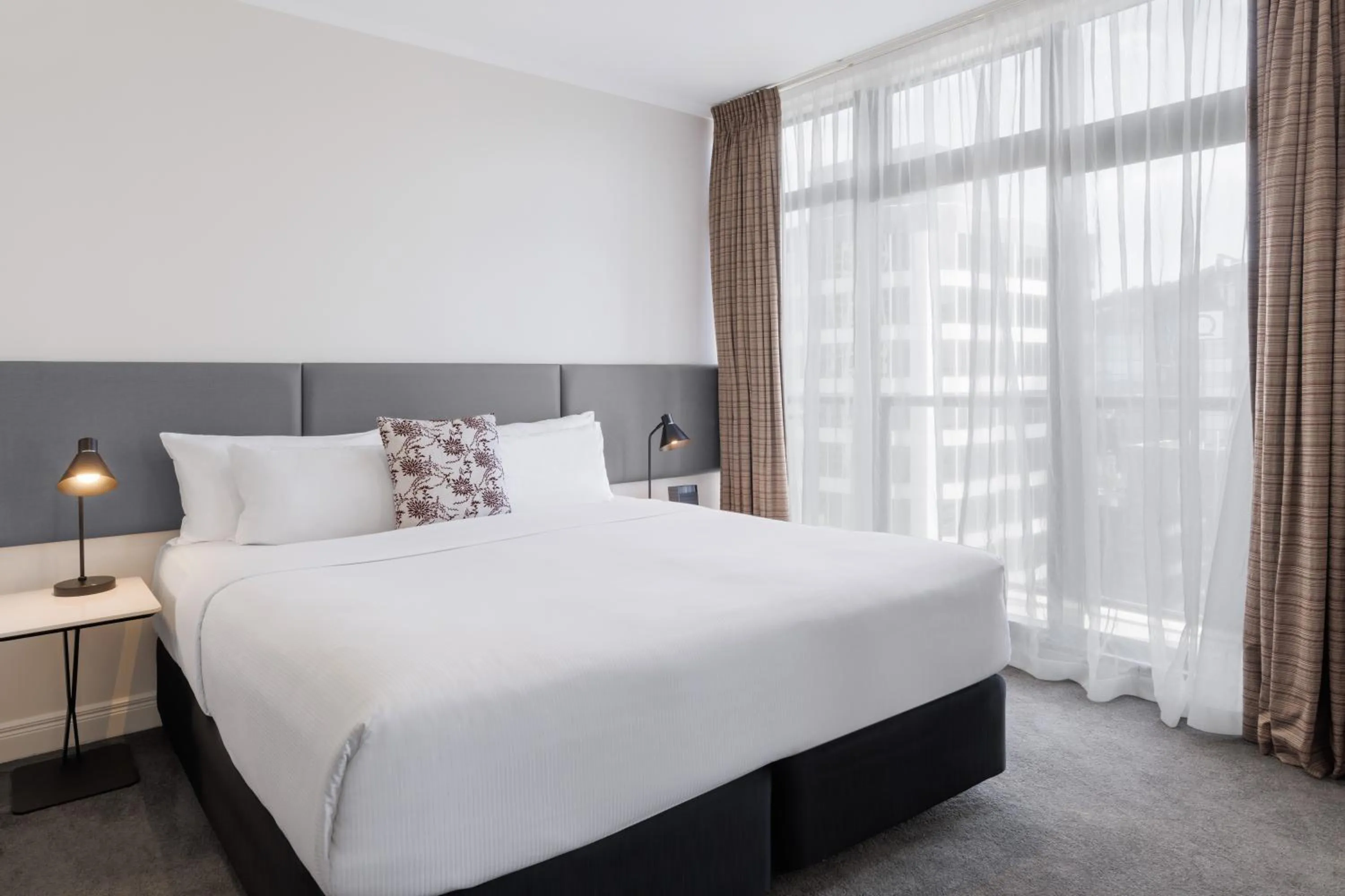 Bed in Adina Citylife Auckland