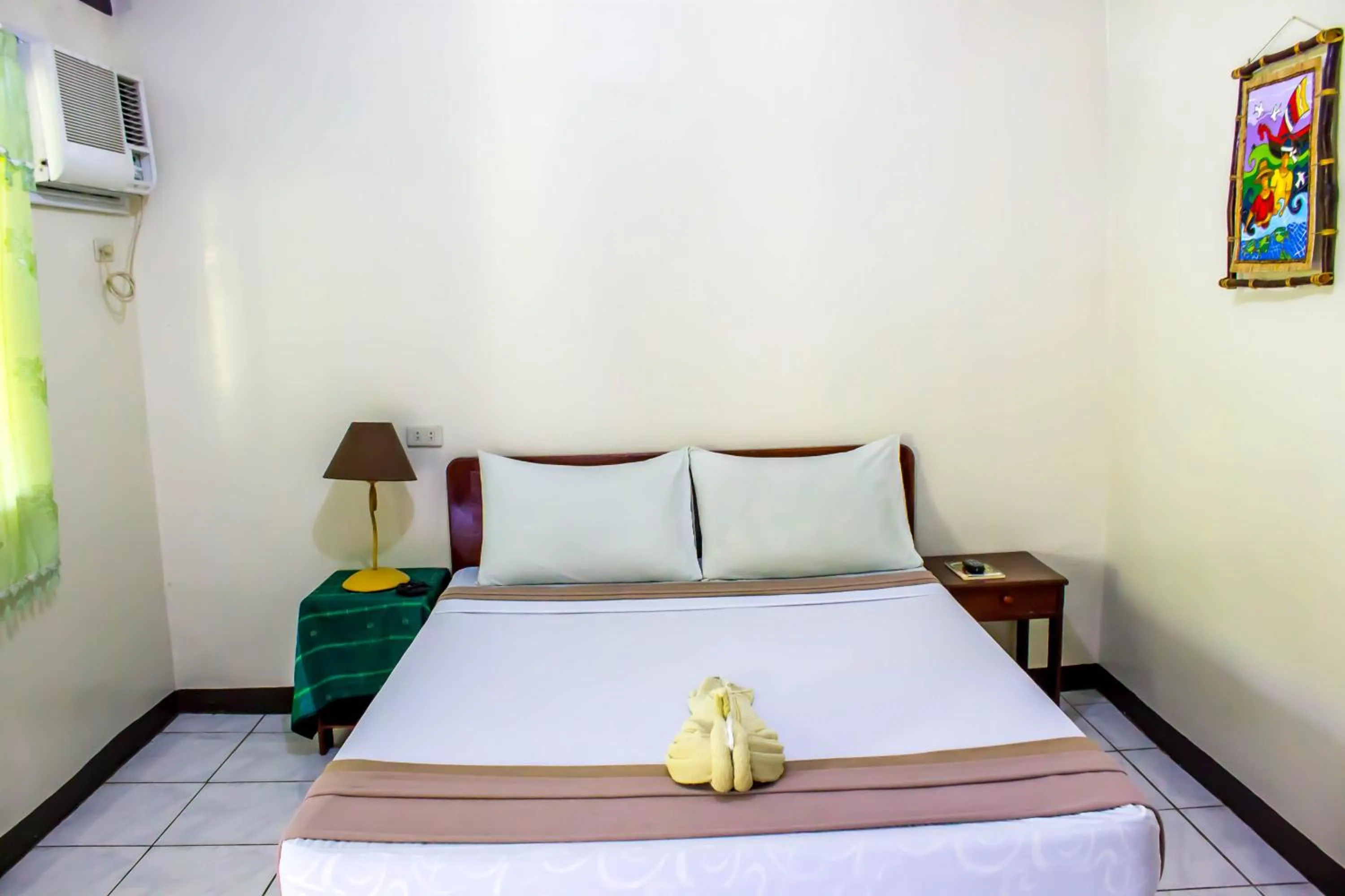 Photo of the whole room, Bed in Remari Tourist Inn