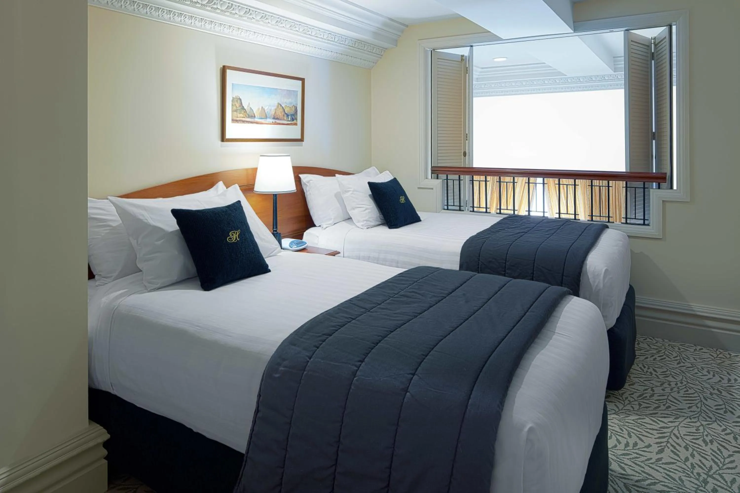 Bed in Adina Heritage Christchurch