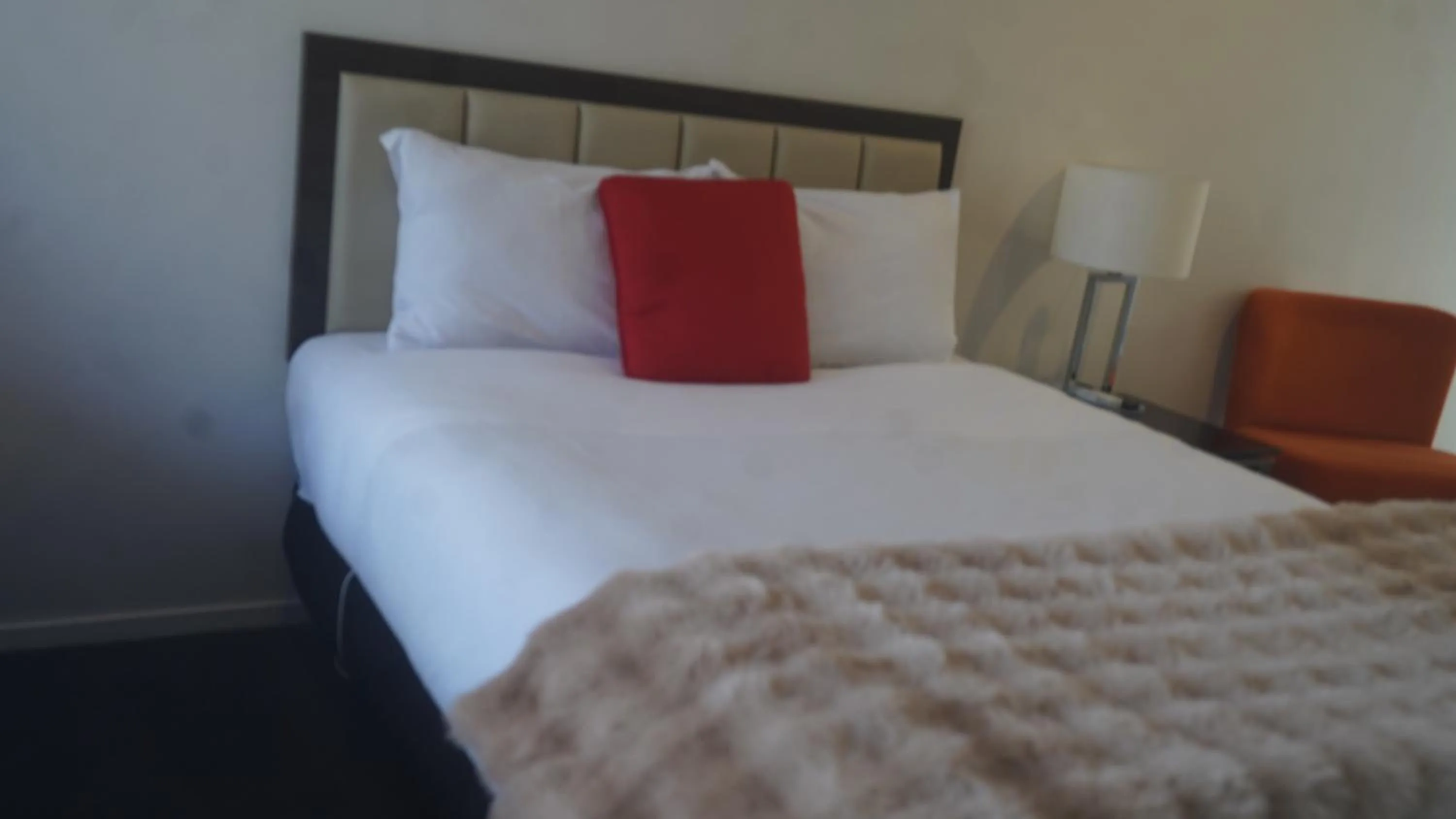 Bed in Abbey Motor Lodge