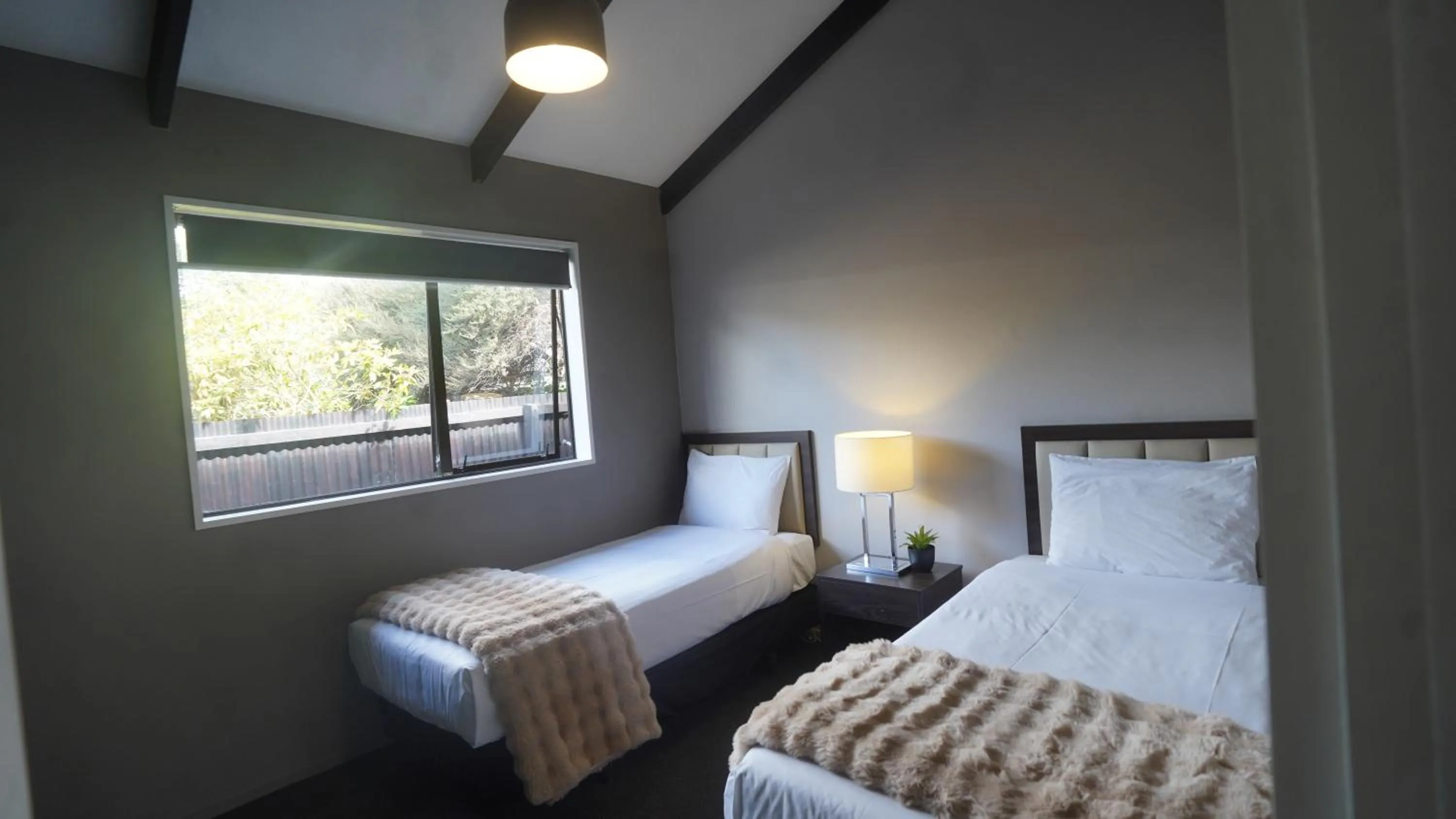 Bed in Abbey Motor Lodge