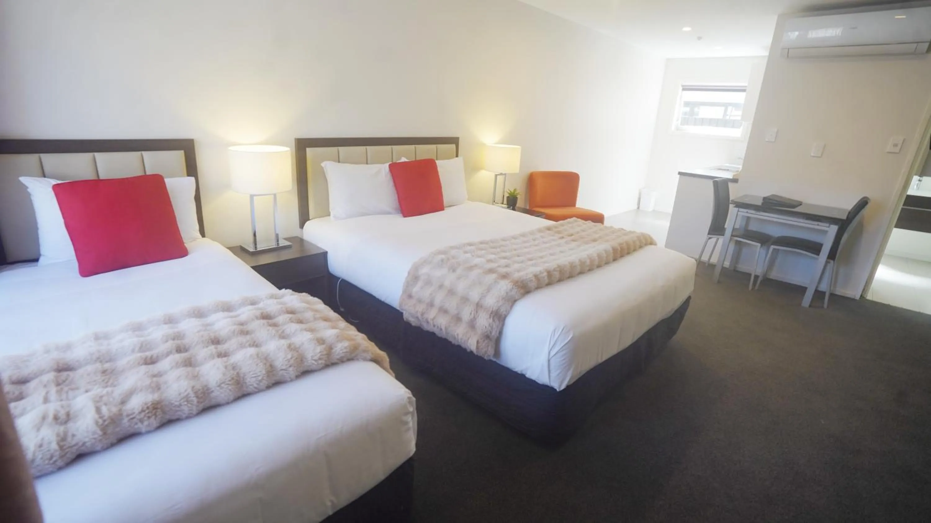 Bed in Abbey Motor Lodge