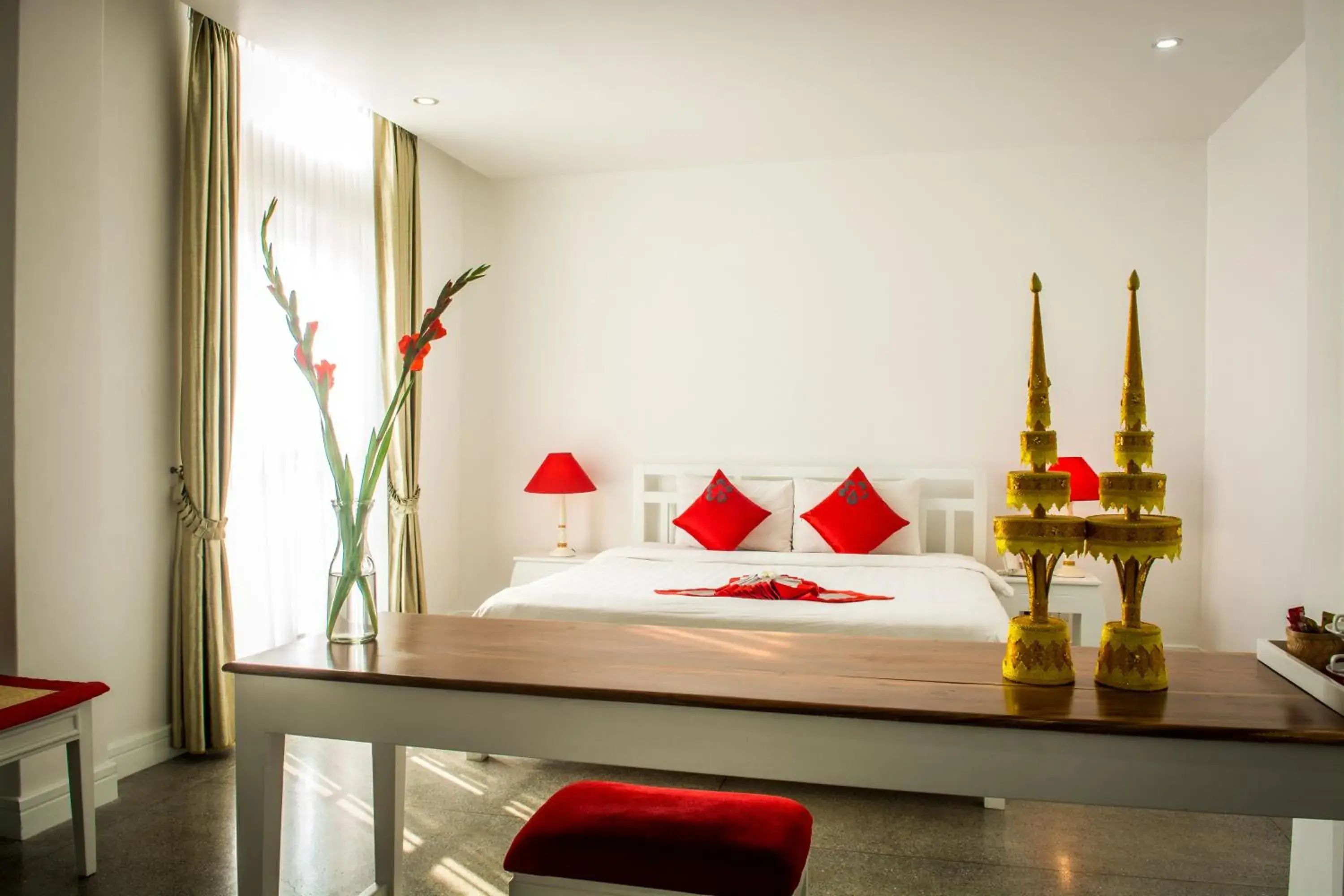 Bedroom, Bed in The Frangipani Royal Palace Hotel Bedroom, Bed in The Frangipani Royal Palace Hotel