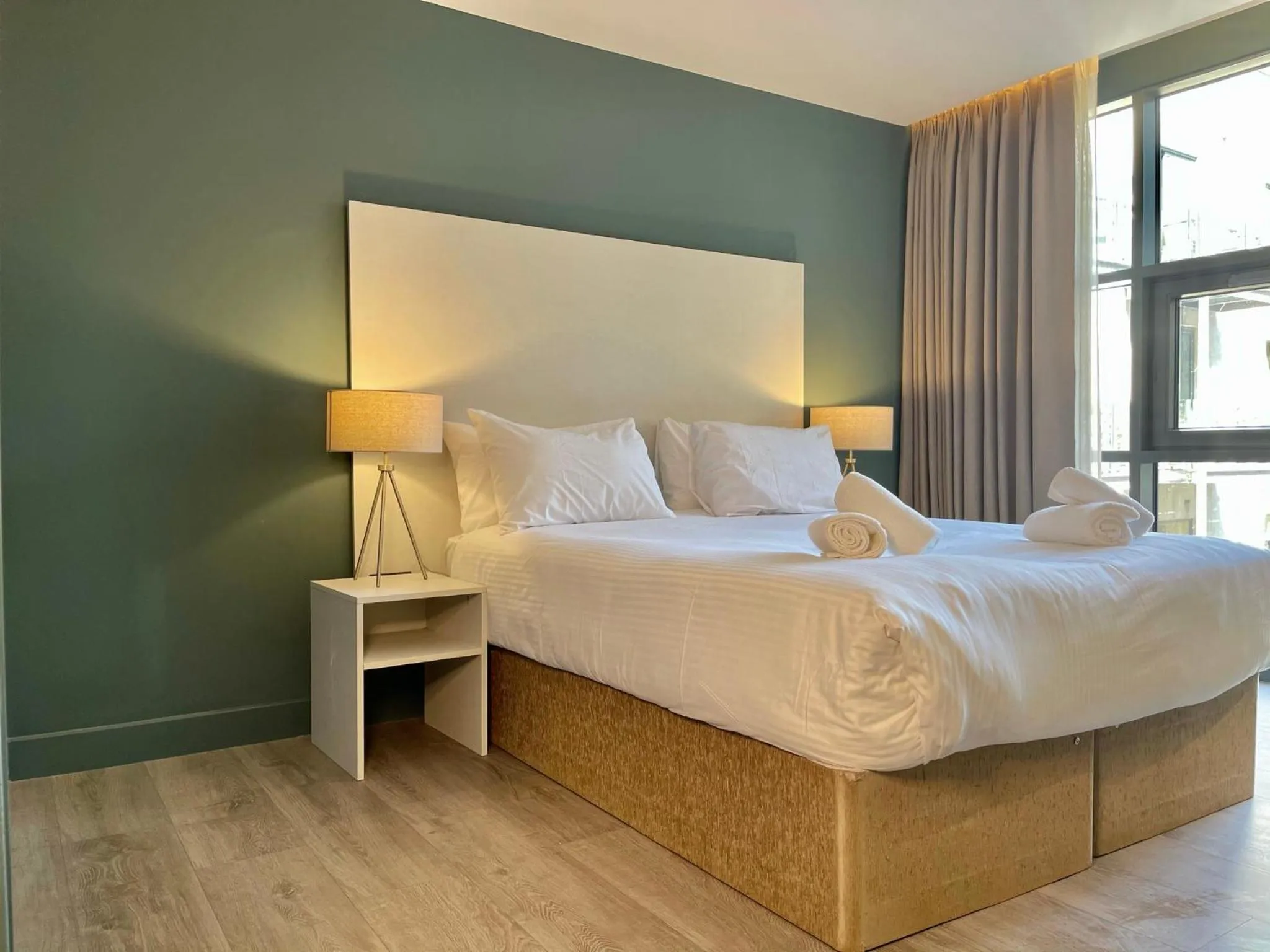 Bed in Axiom Park Hotel