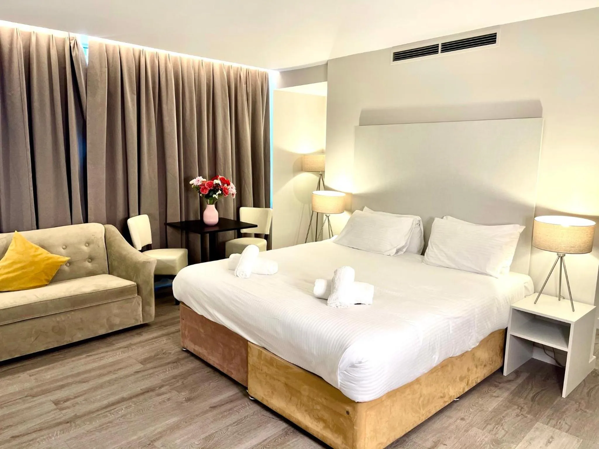 Bed in Axiom Park Hotel