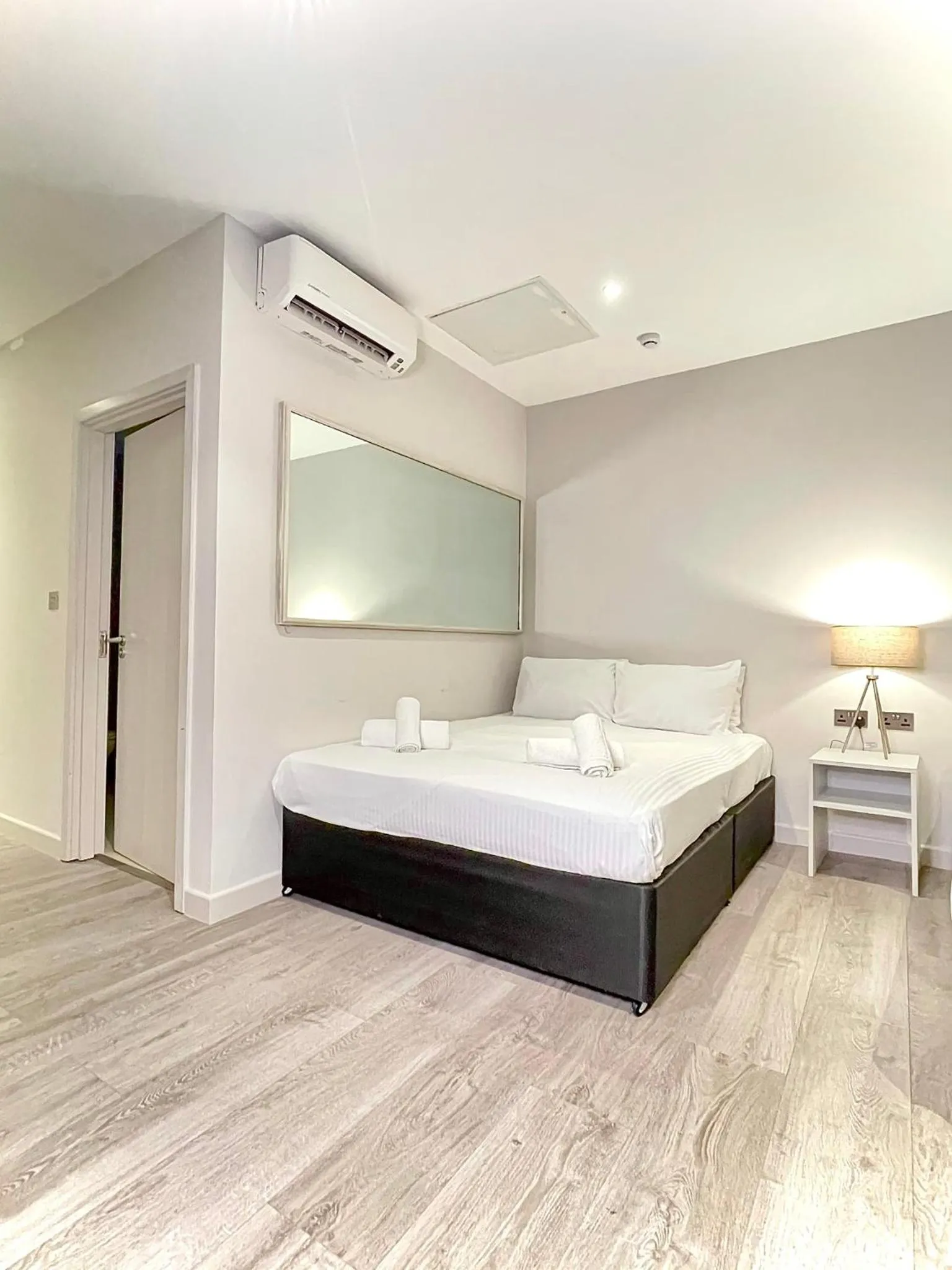 Bed in Axiom Park Hotel