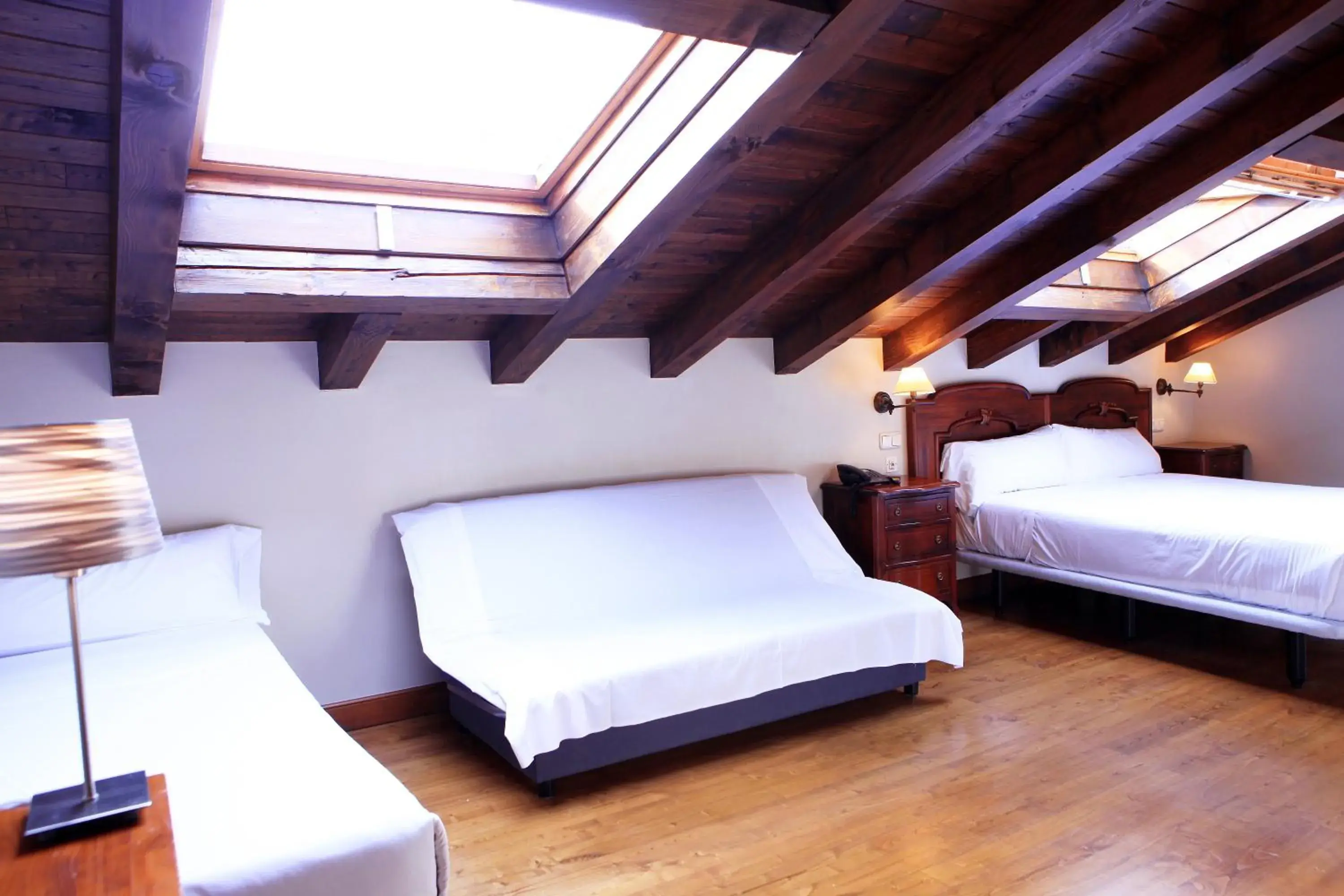 Triple Room in Hostal Antxitonea Triple Room in Hostal Antxitonea