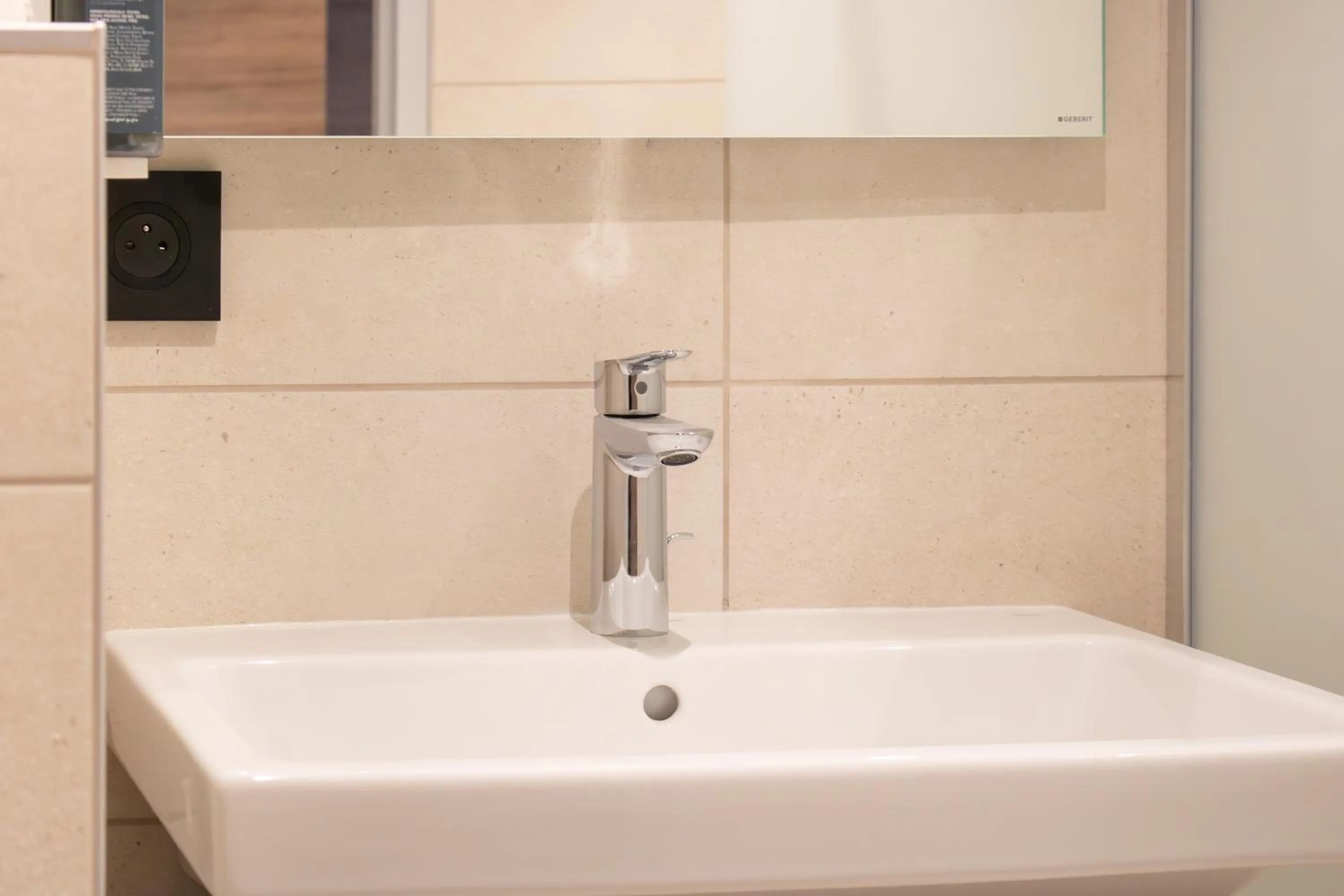 Bathroom in Brit Hotel Cahors - Le Valentré