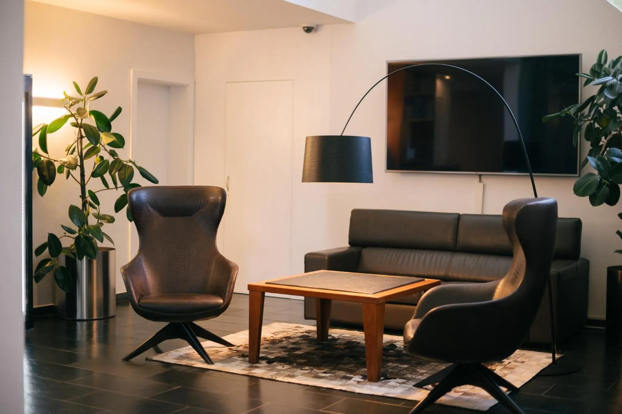 Communal lounge/ TV room in Appartement KroneLiving