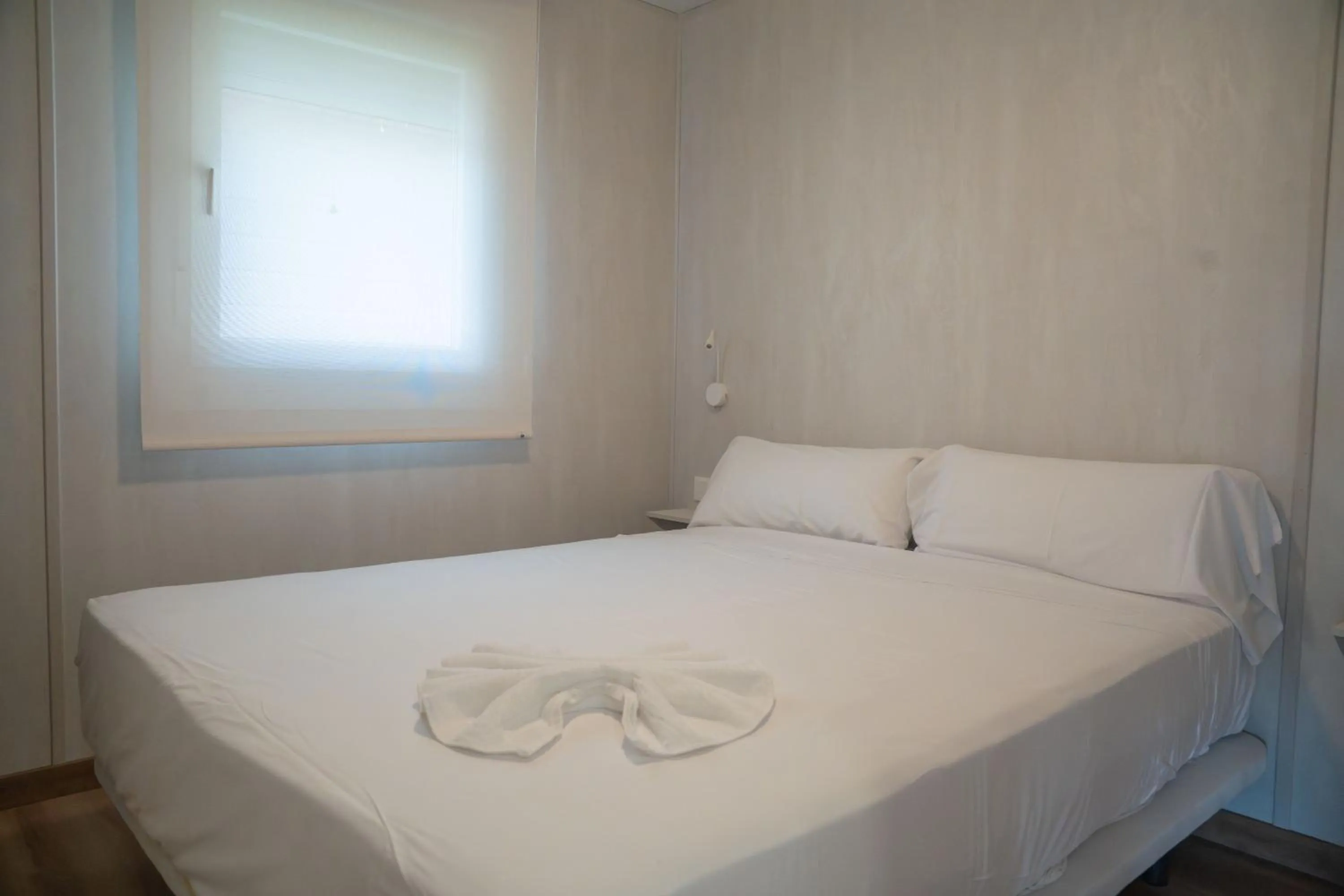 Bed in La Marina Resort