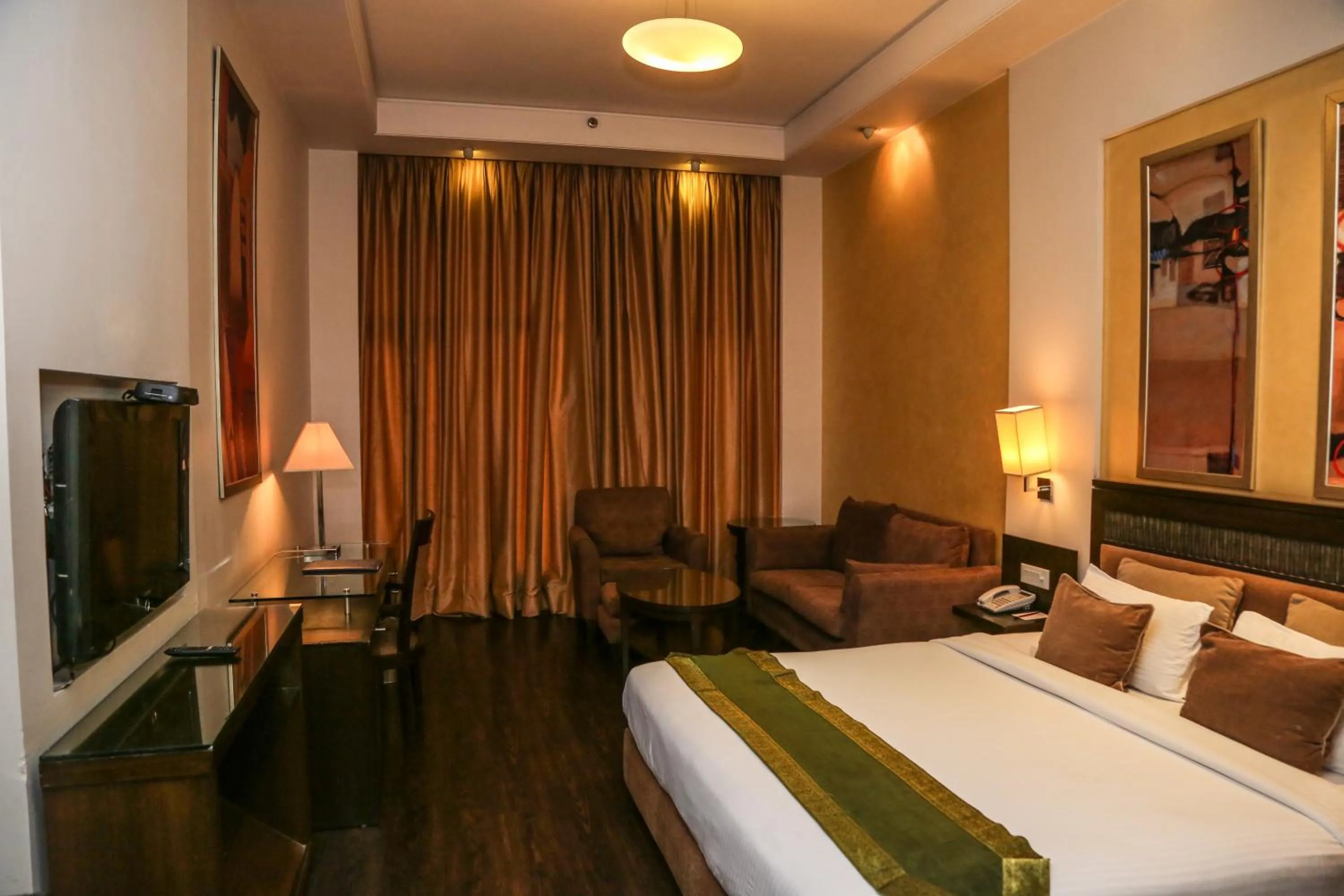 Photo of the whole room, Bed in Western Court Panchkula