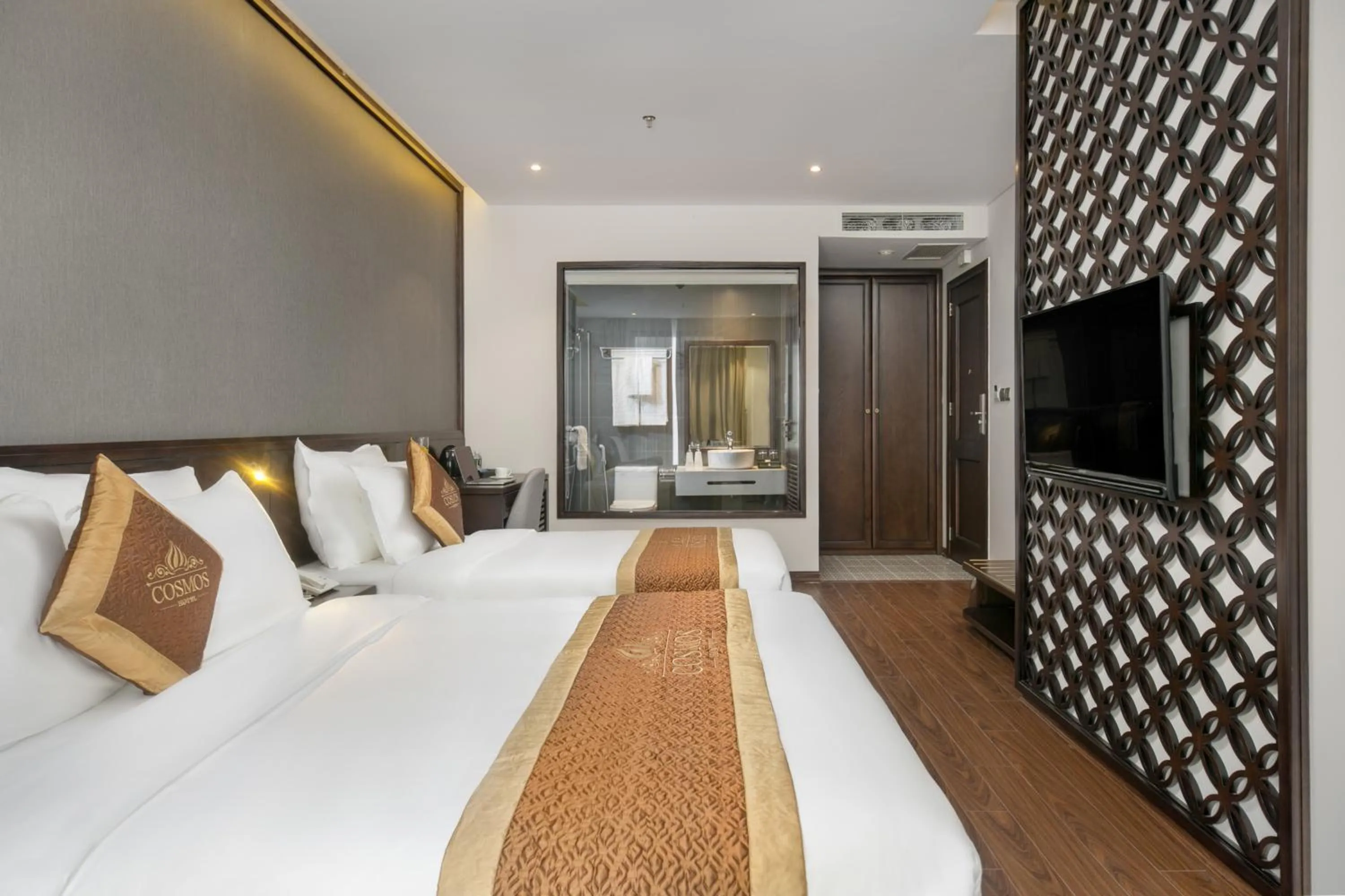 Communal lounge/ TV room, Bed in Cosmos Hotel Danang