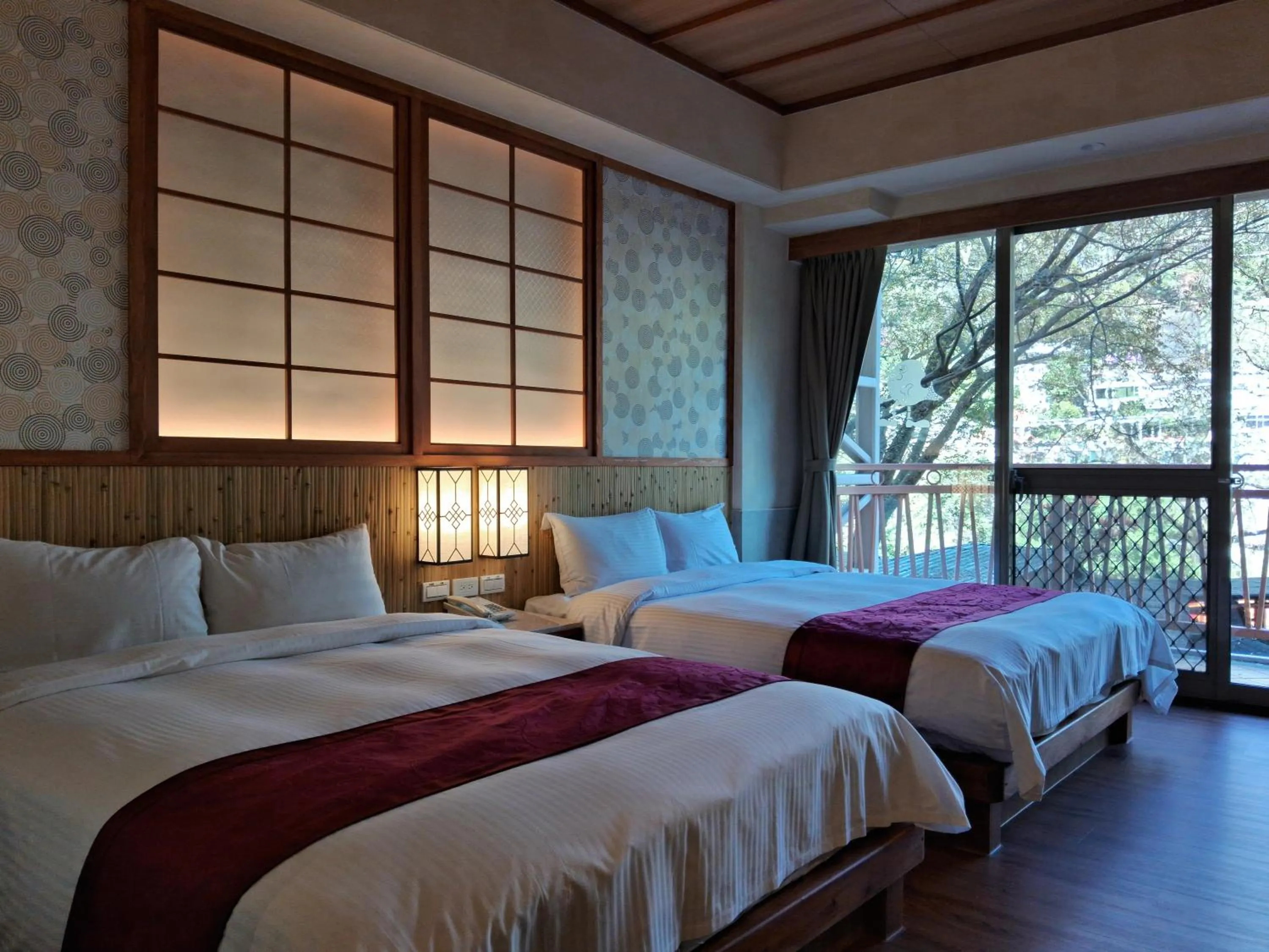 Bed in Ku Kuan Resort Hotel
