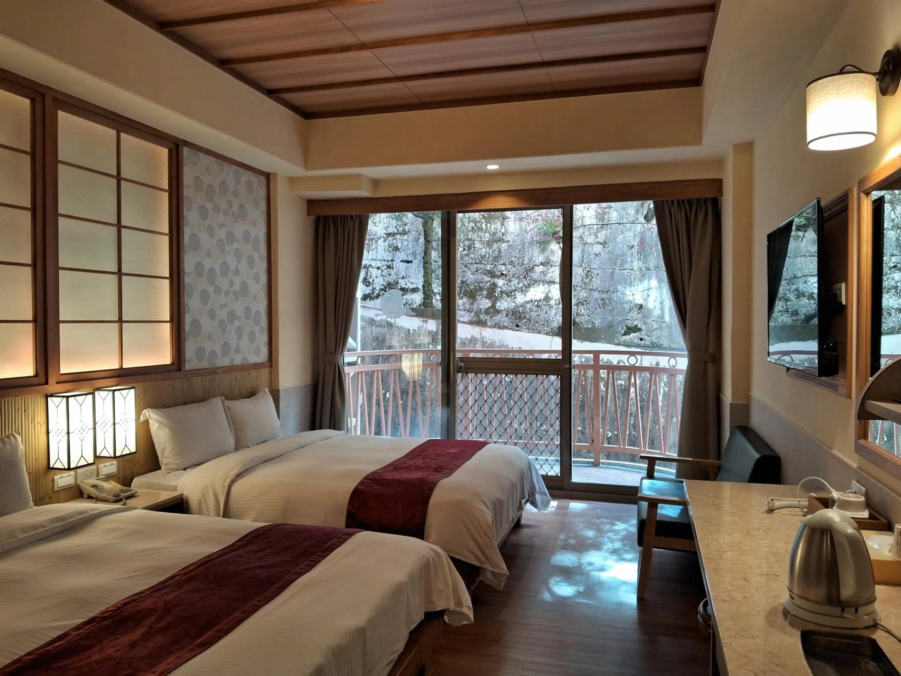 Bed in Ku Kuan Resort Hotel