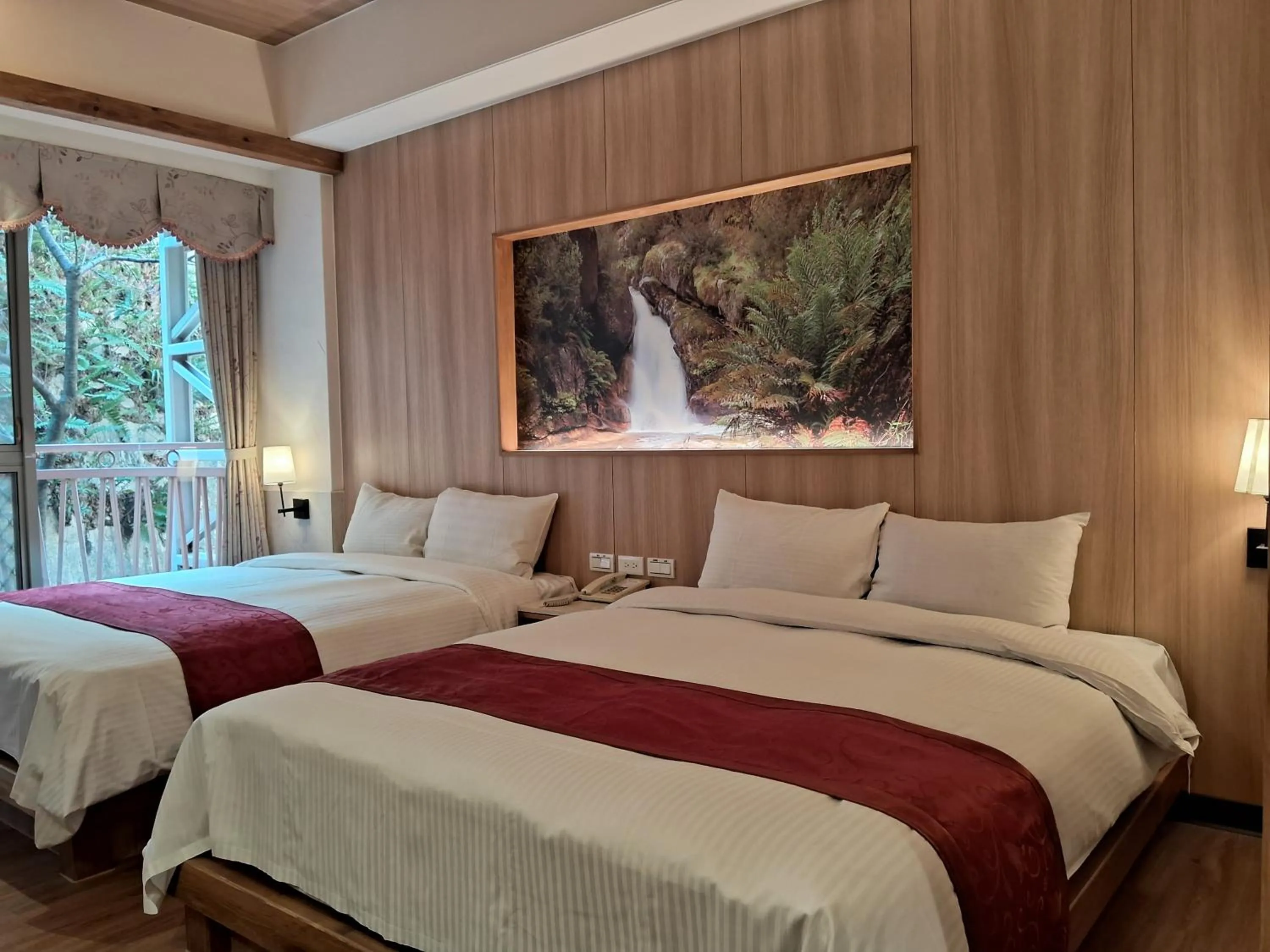 Bed in Ku Kuan Resort Hotel