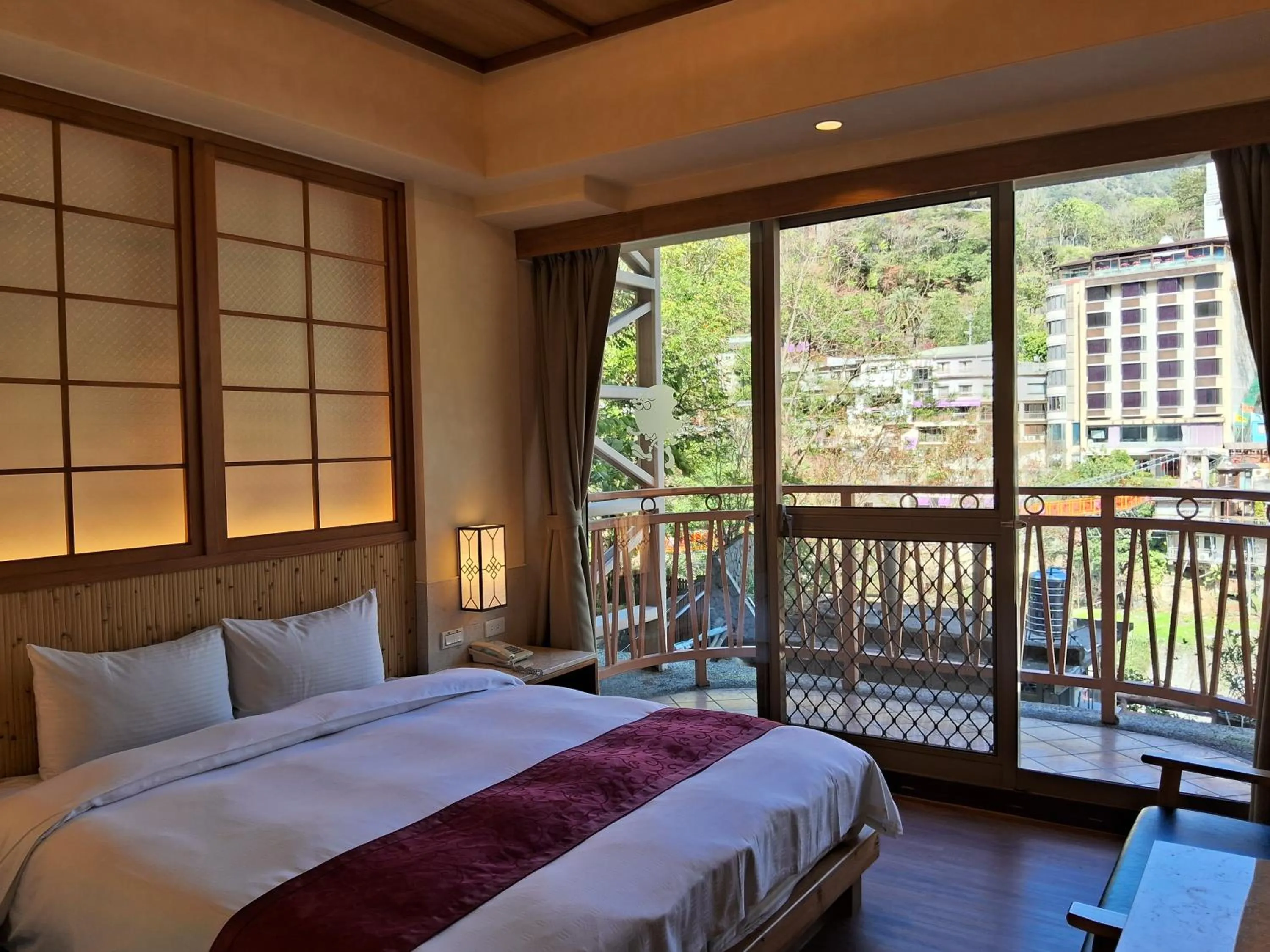 Bed in Ku Kuan Resort Hotel