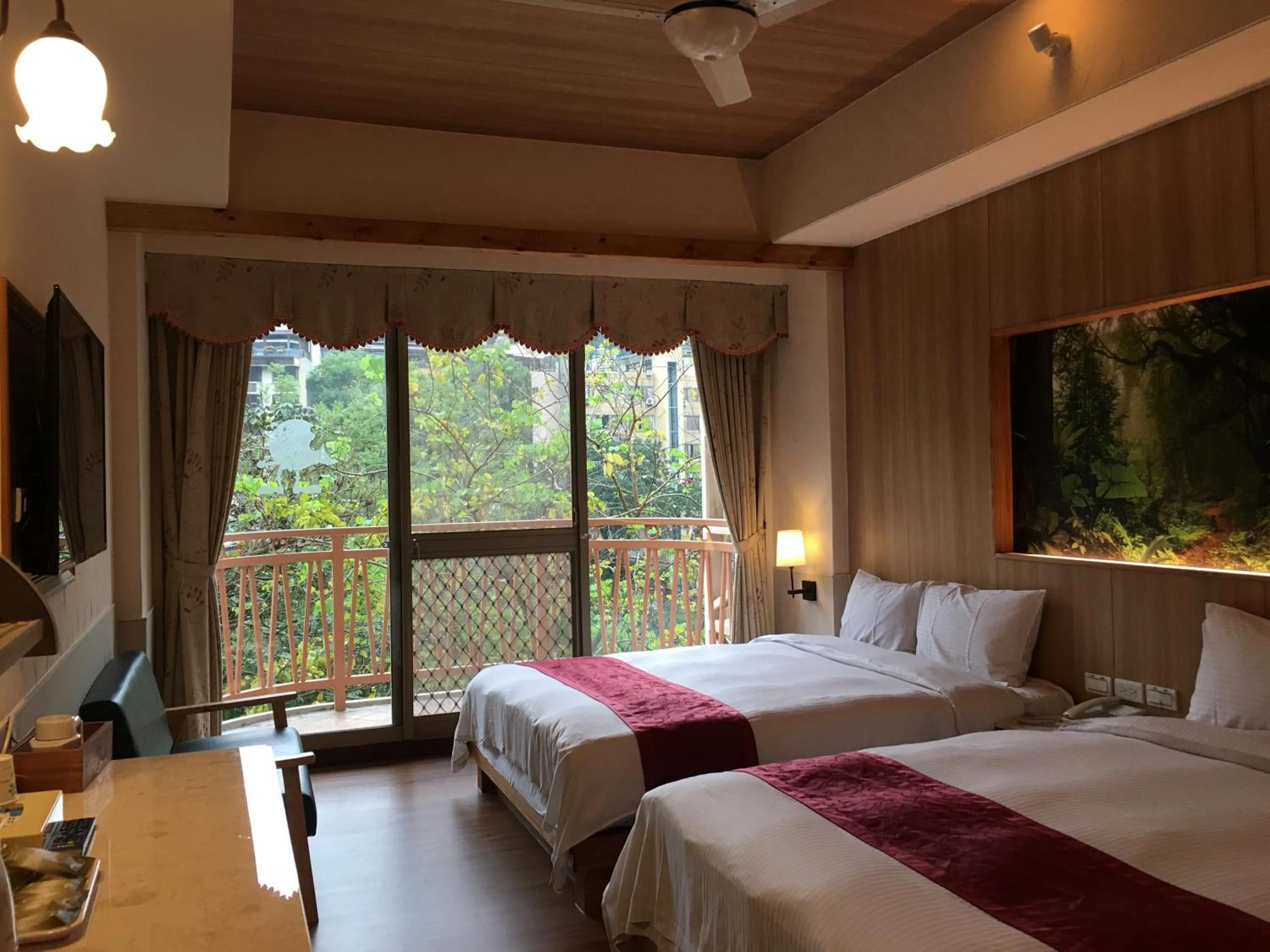 Bed in Ku Kuan Resort Hotel