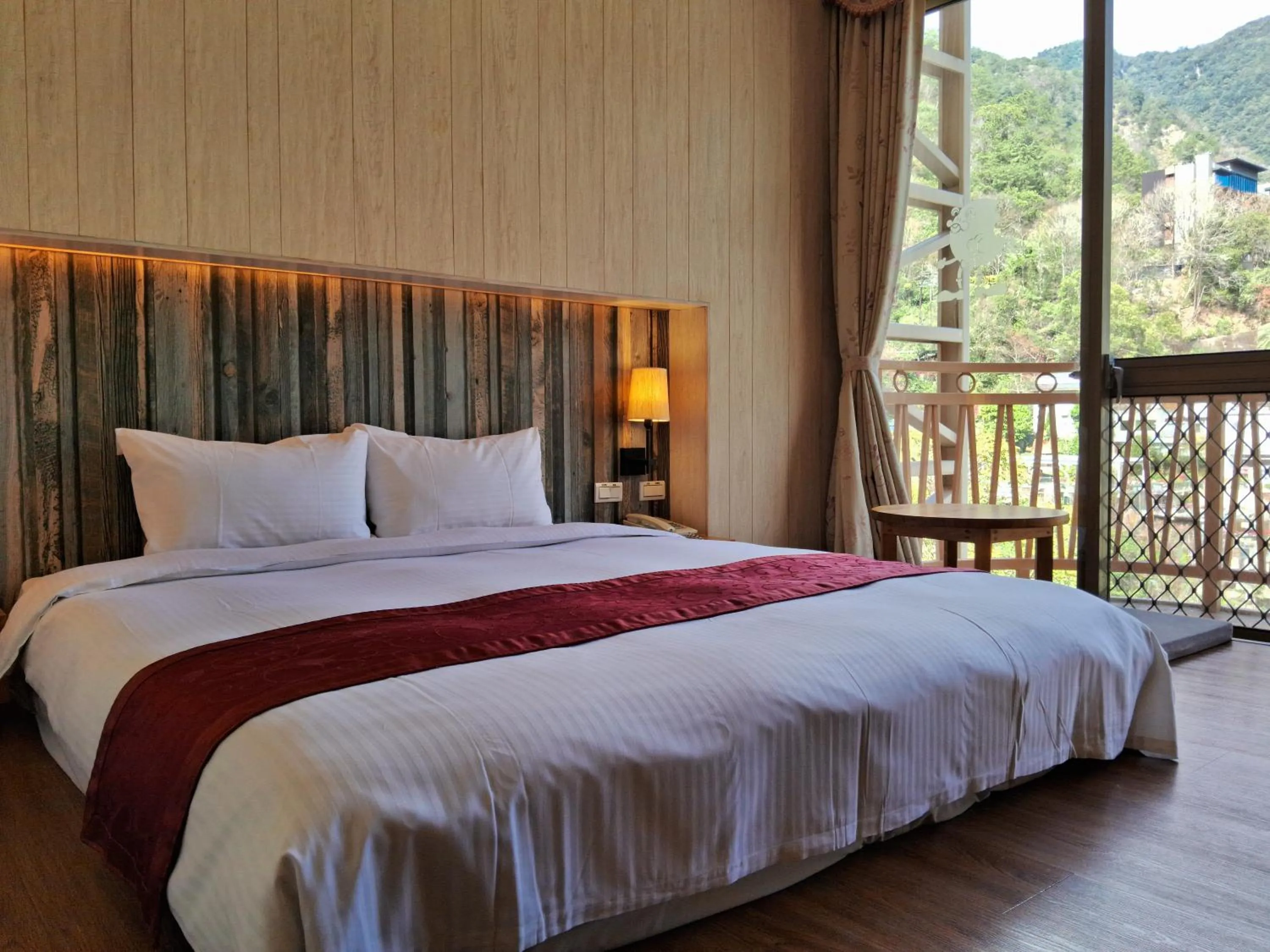 Bed in Ku Kuan Resort Hotel