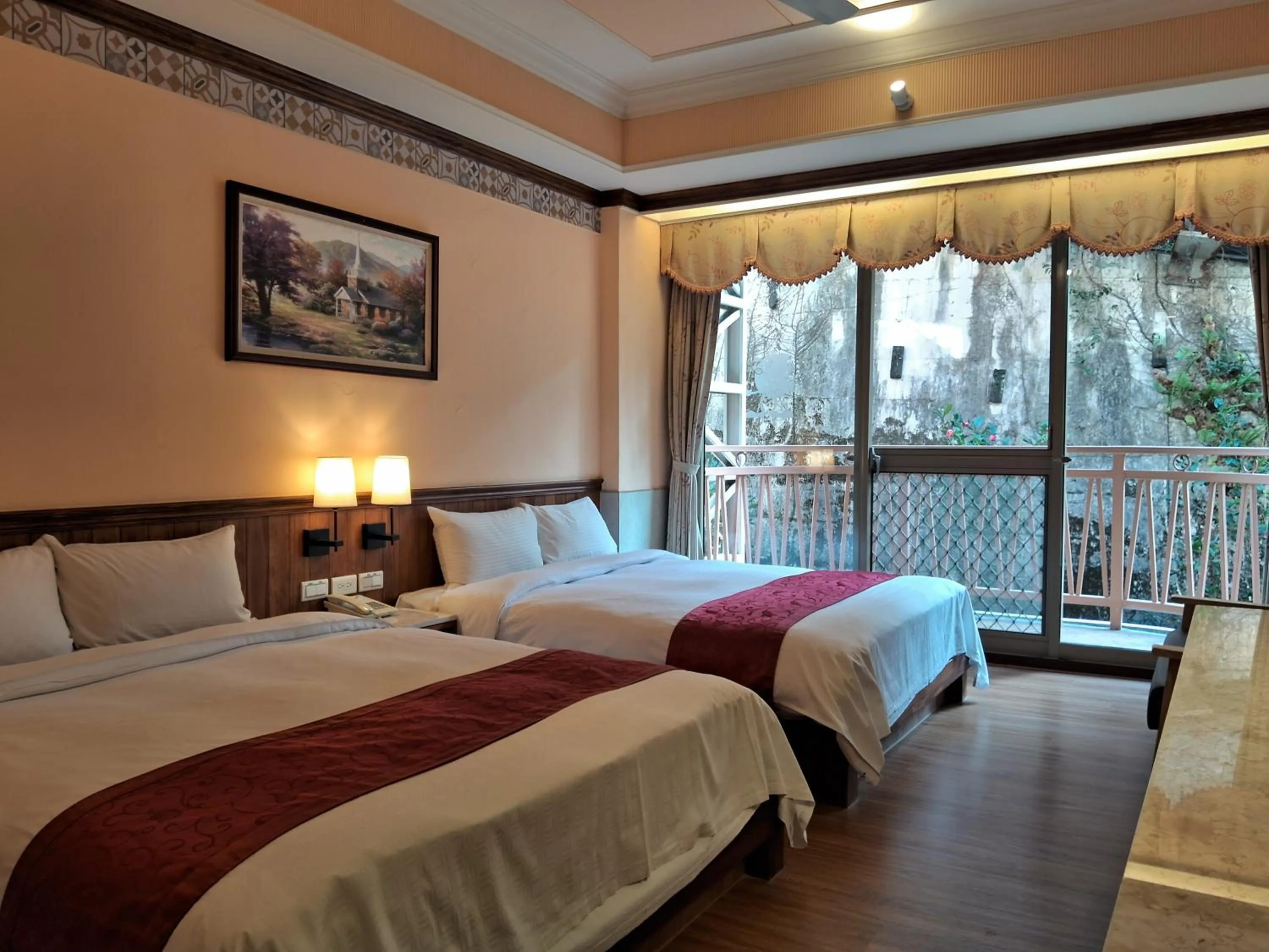 Bed in Ku Kuan Resort Hotel