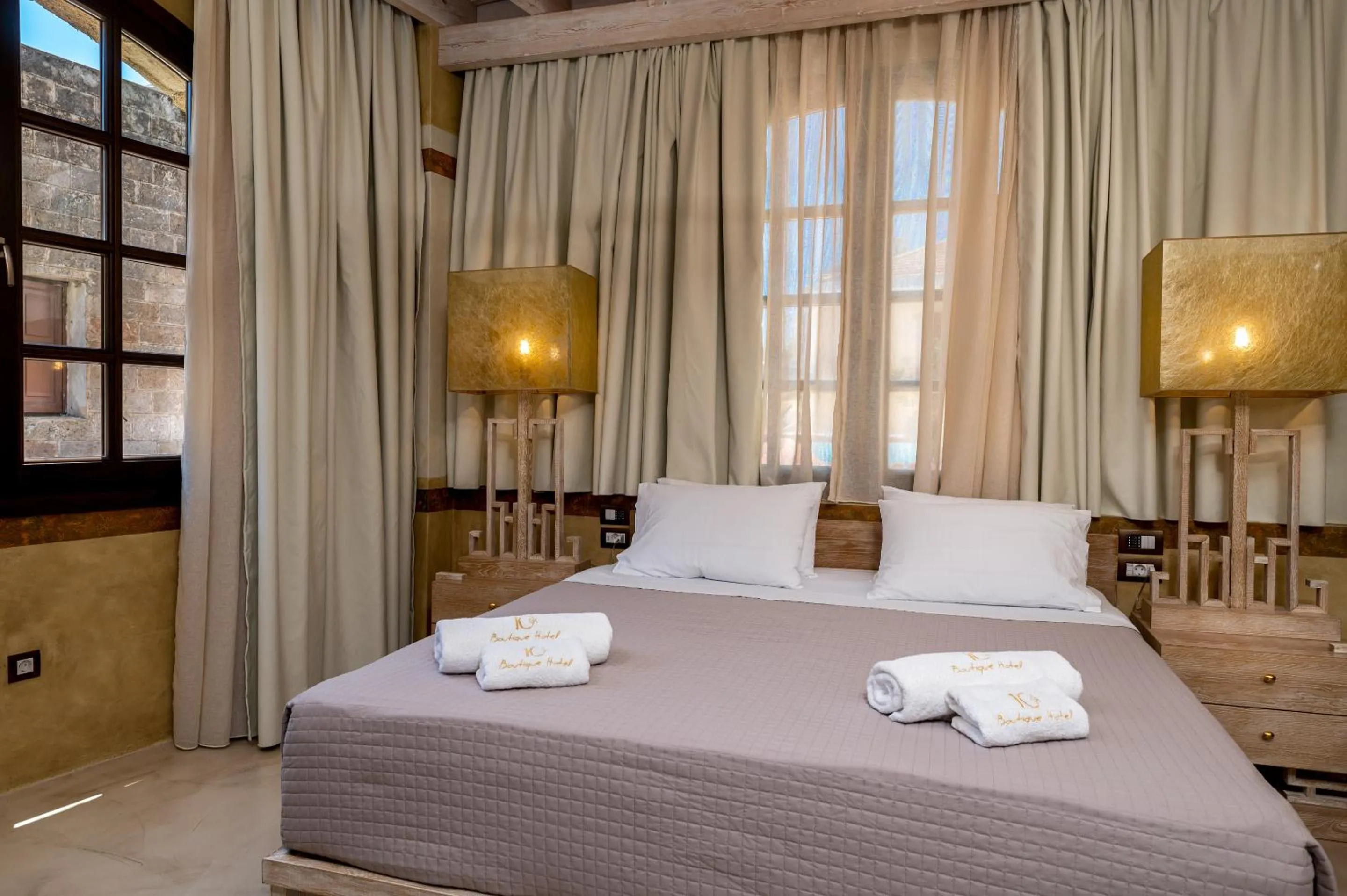 Bed in 10GR Boutique Hotel & Wine Bar