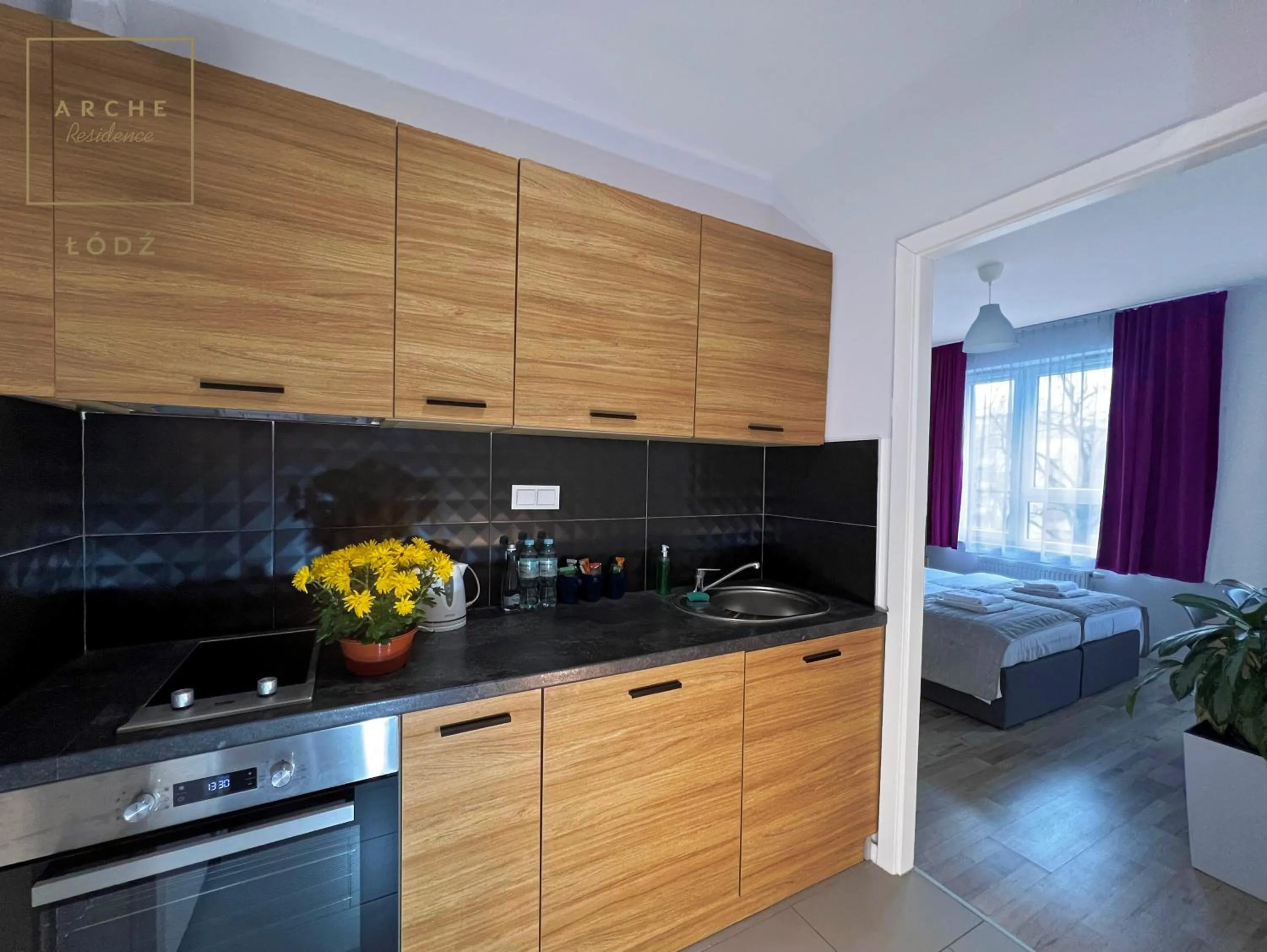 Kitchen or kitchenette, Bed in Arche Residence Łódź