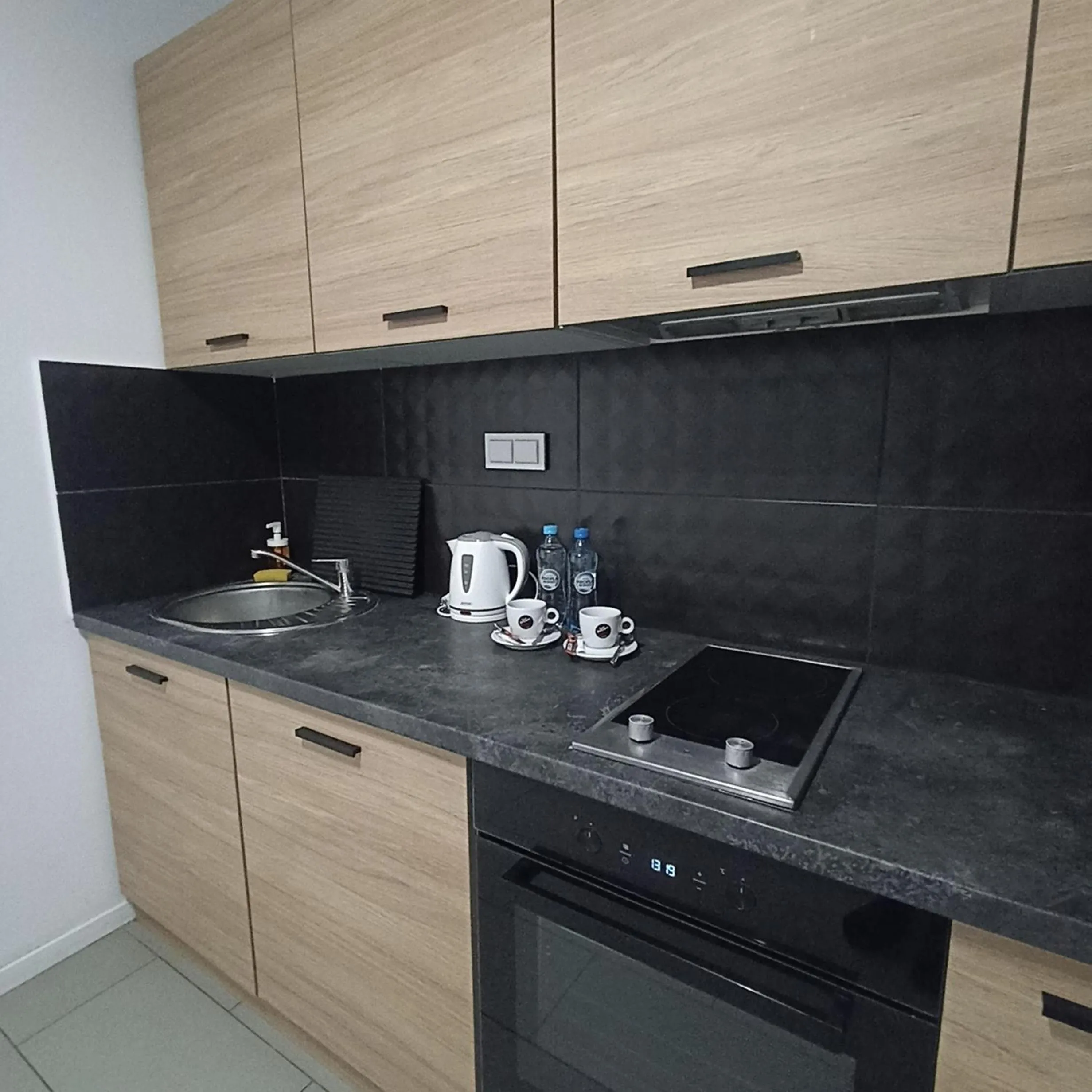 Coffee/tea facilities in Arche Residence Łódź