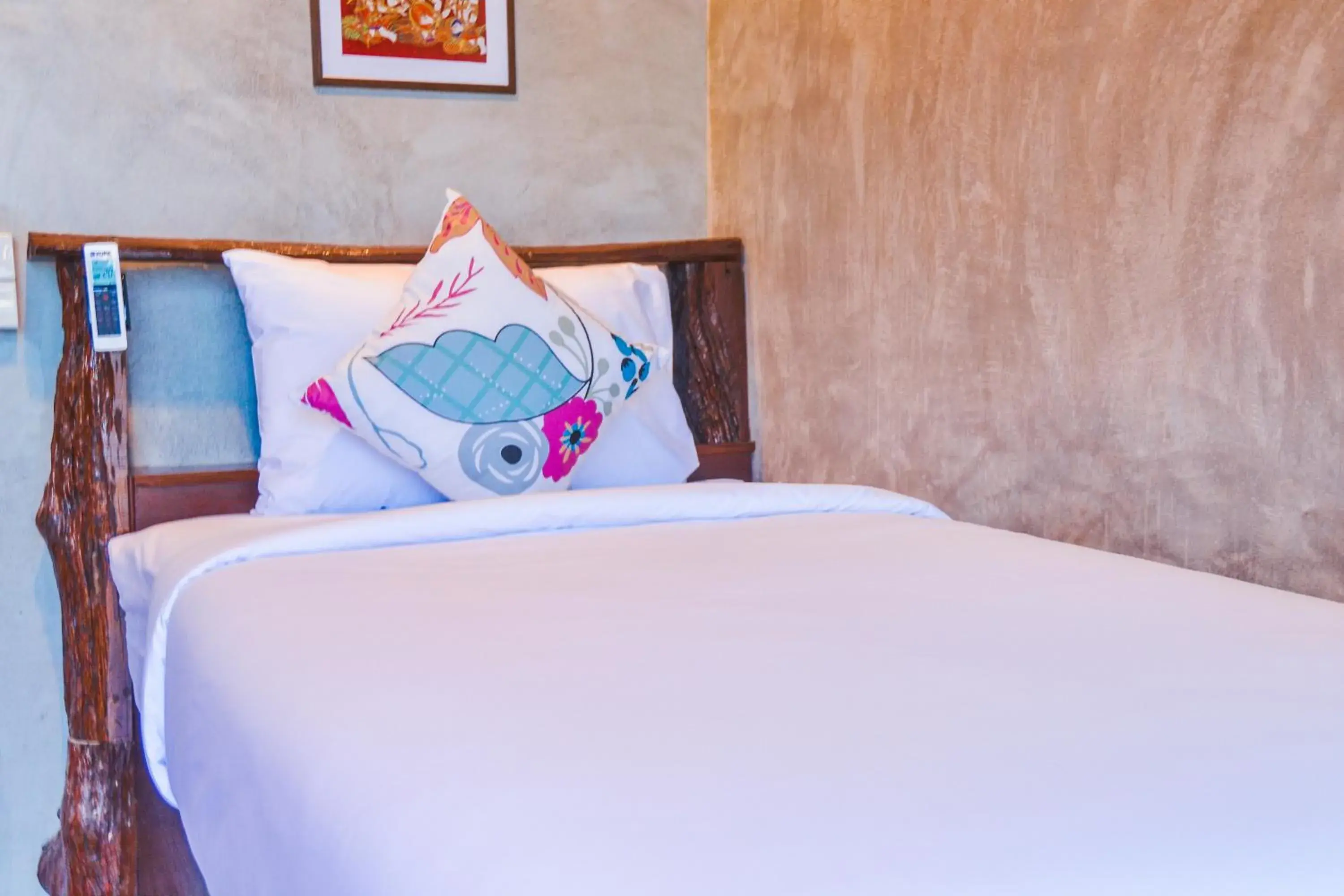 Bed in Baan Tubkaek Hotel Bed in Baan Tubkaek Hotel