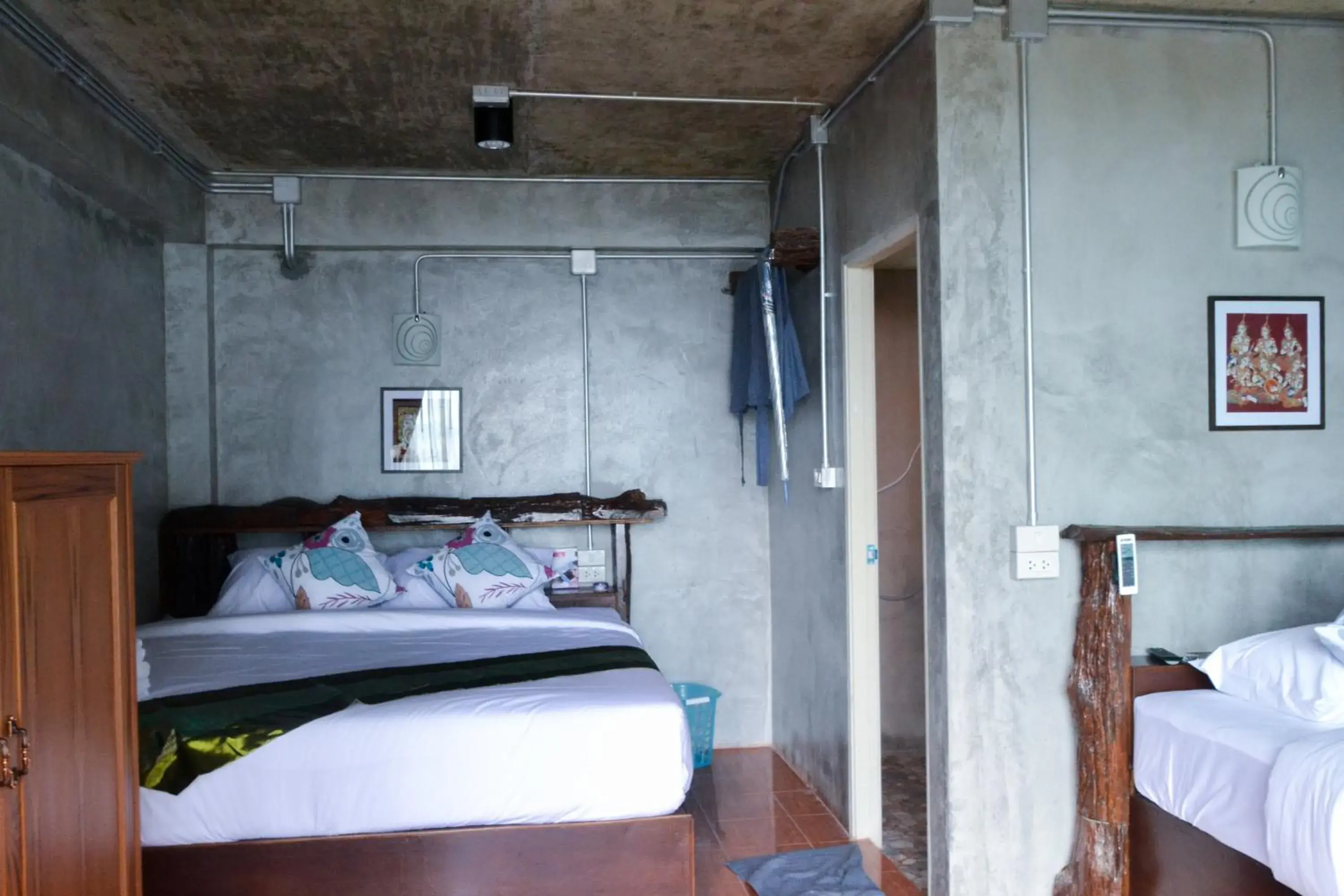 Bed in Baan Tubkaek Hotel Bed in Baan Tubkaek Hotel