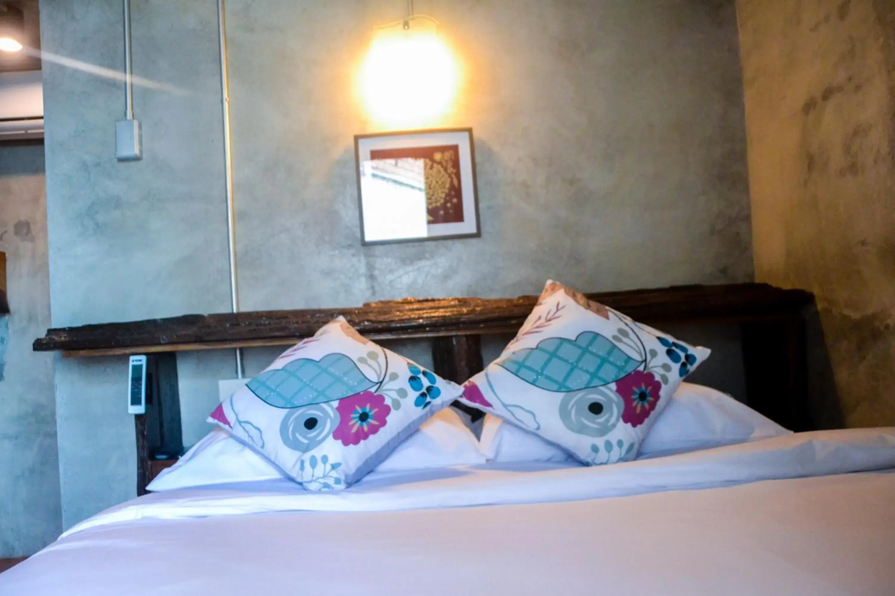 Bed in Baan Tubkaek Hotel Bed in Baan Tubkaek Hotel