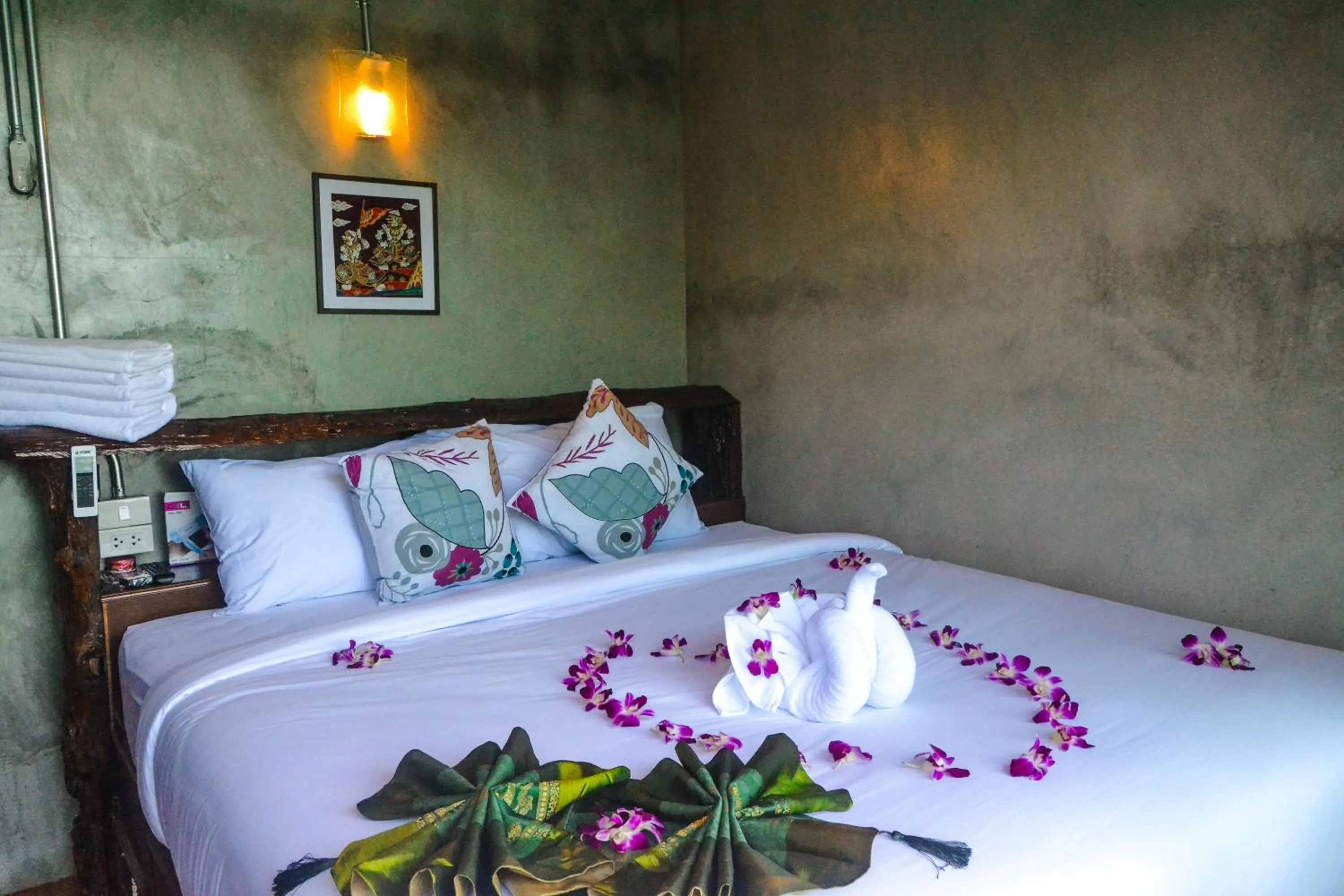 Bed in Baan Tubkaek Hotel