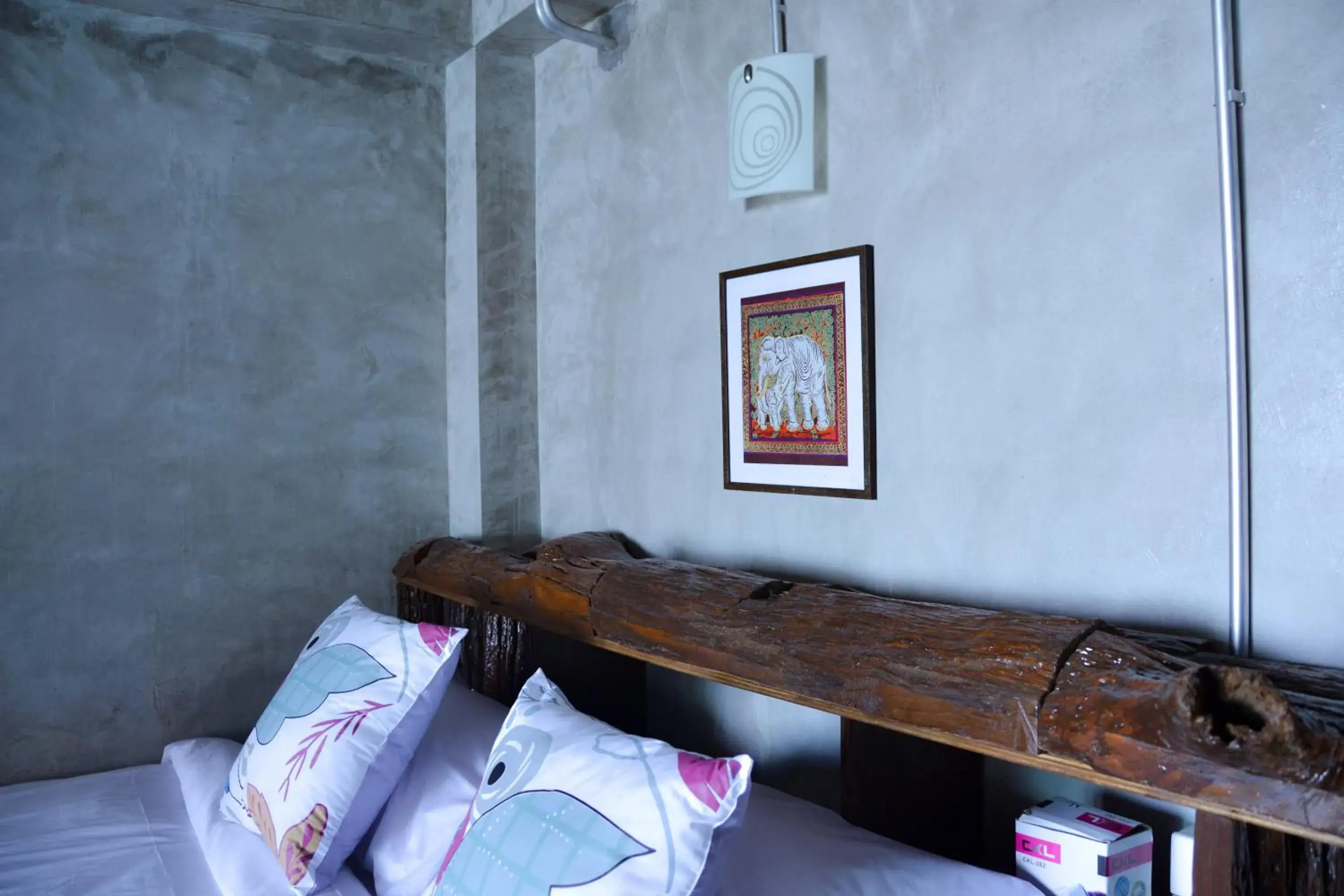 Bed in Baan Tubkaek Hotel Bed in Baan Tubkaek Hotel