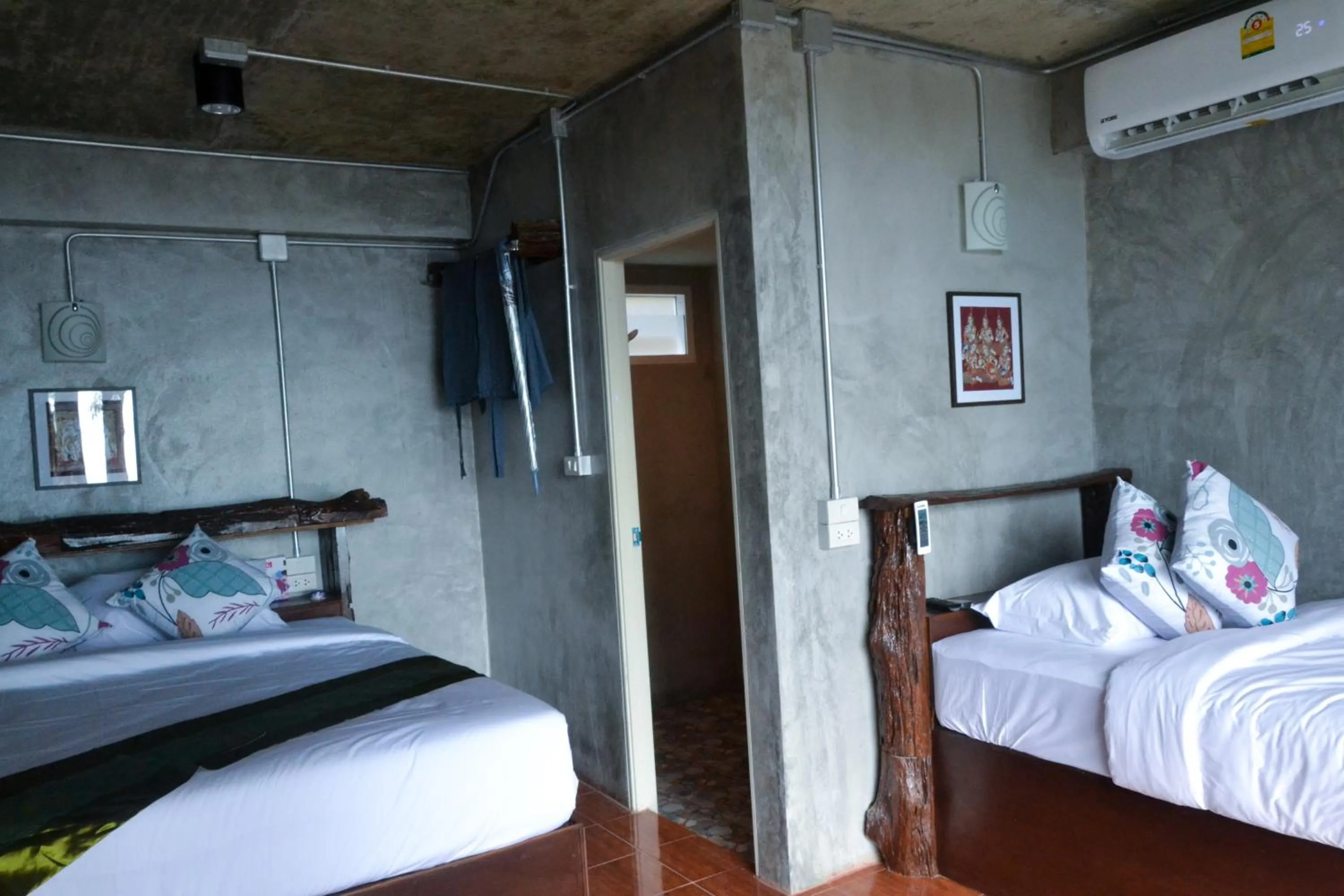 Bed in Baan Tubkaek Hotel