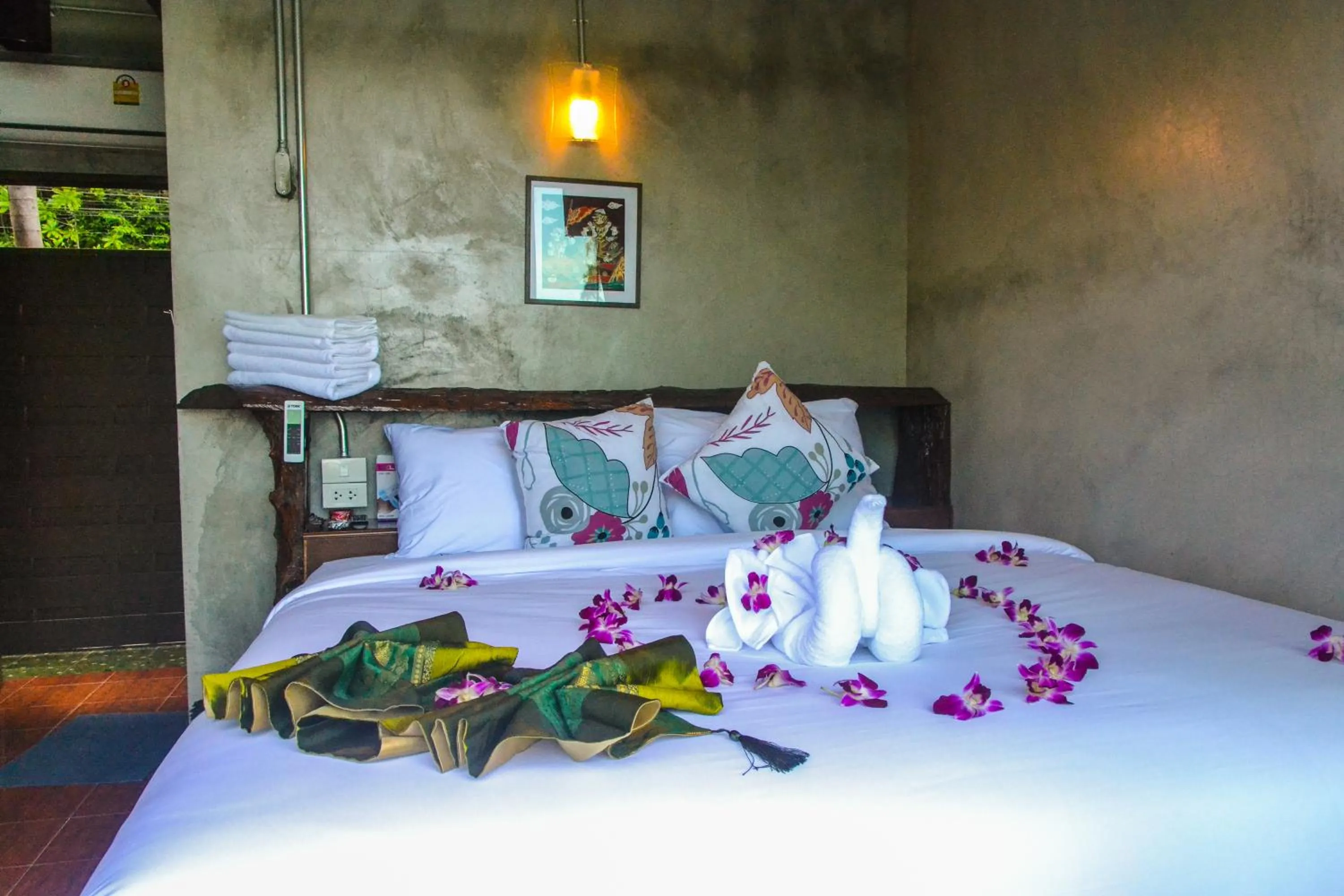 Bed in Baan Tubkaek Hotel