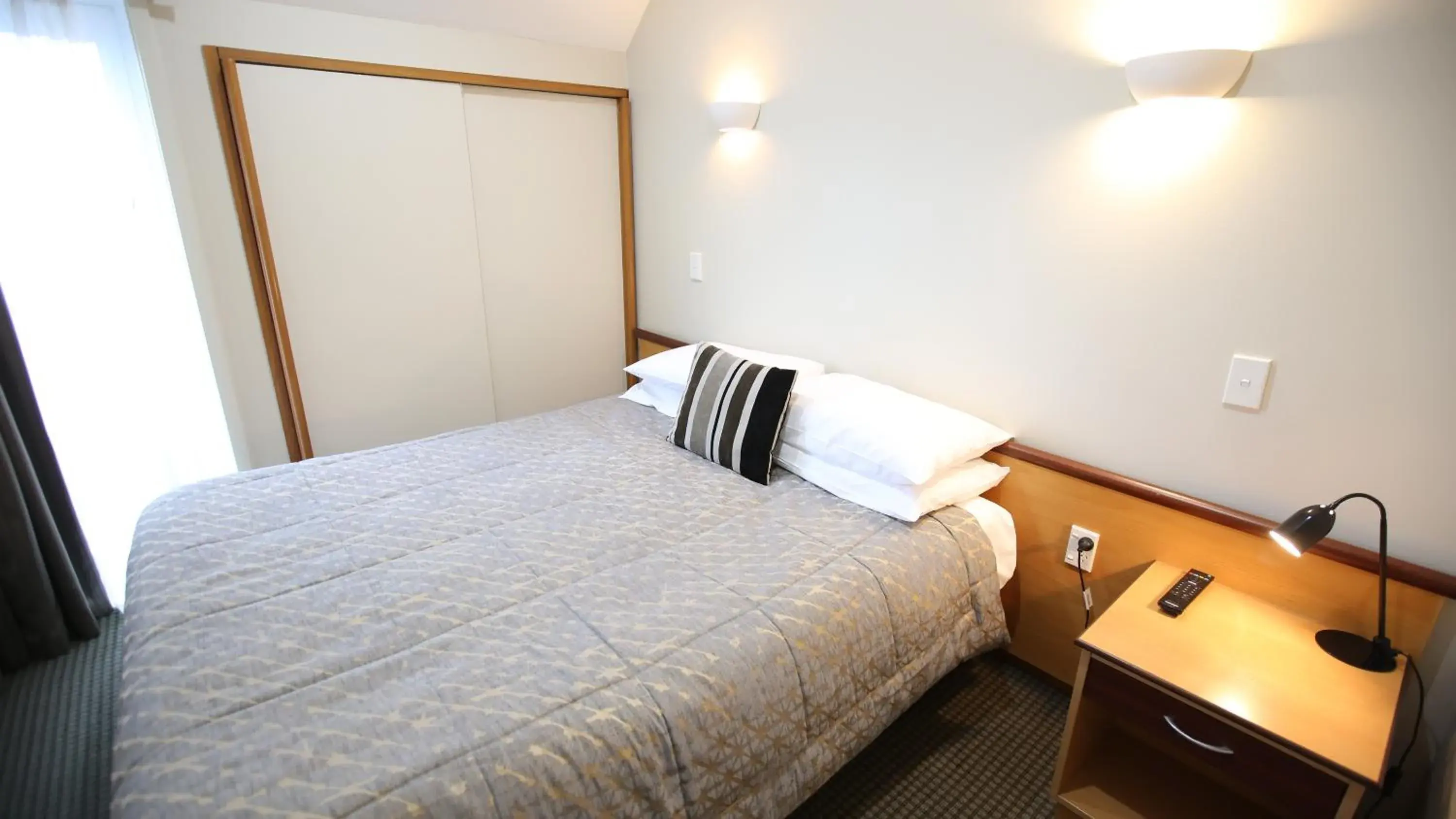 Bedroom, Bed in Dunedin Leisure Lodge - Distinction Bedroom, Bed in Dunedin Leisure Lodge - Distinction