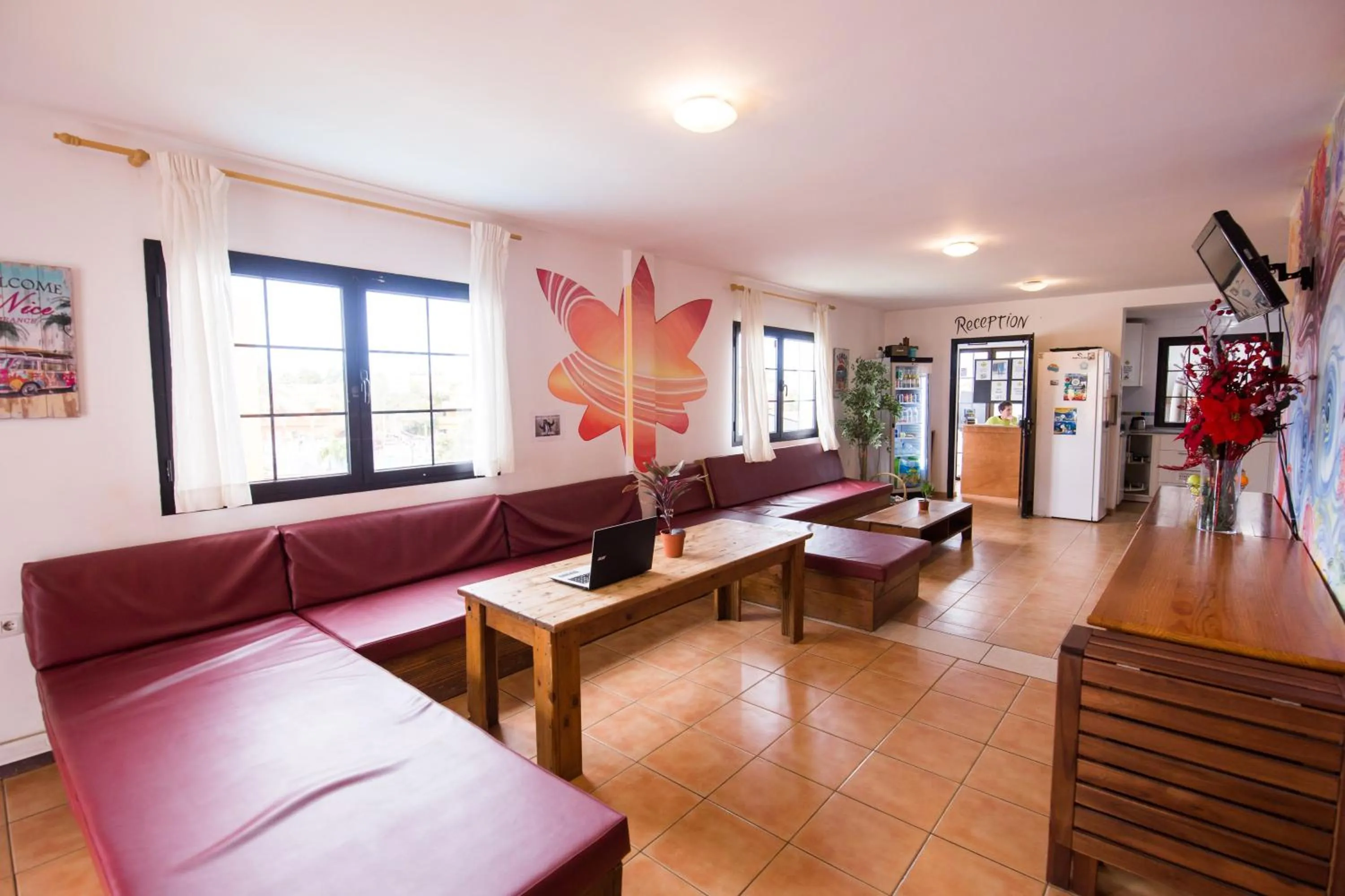 Communal lounge/ TV room in Surf Riders Fuerteventura