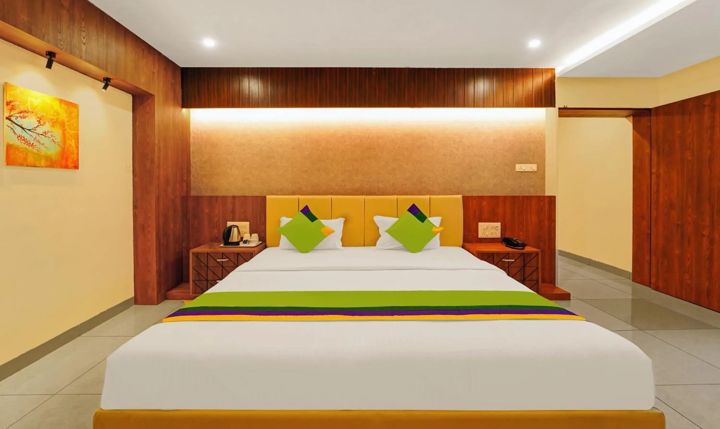 Bedroom, Bed in Treebo Surya Comforts, 200 Mtrs From Kolhapur Railway Station Bedroom, Bed in Treebo Surya Comforts, 200 Mtrs From Kolhapur Railway Station