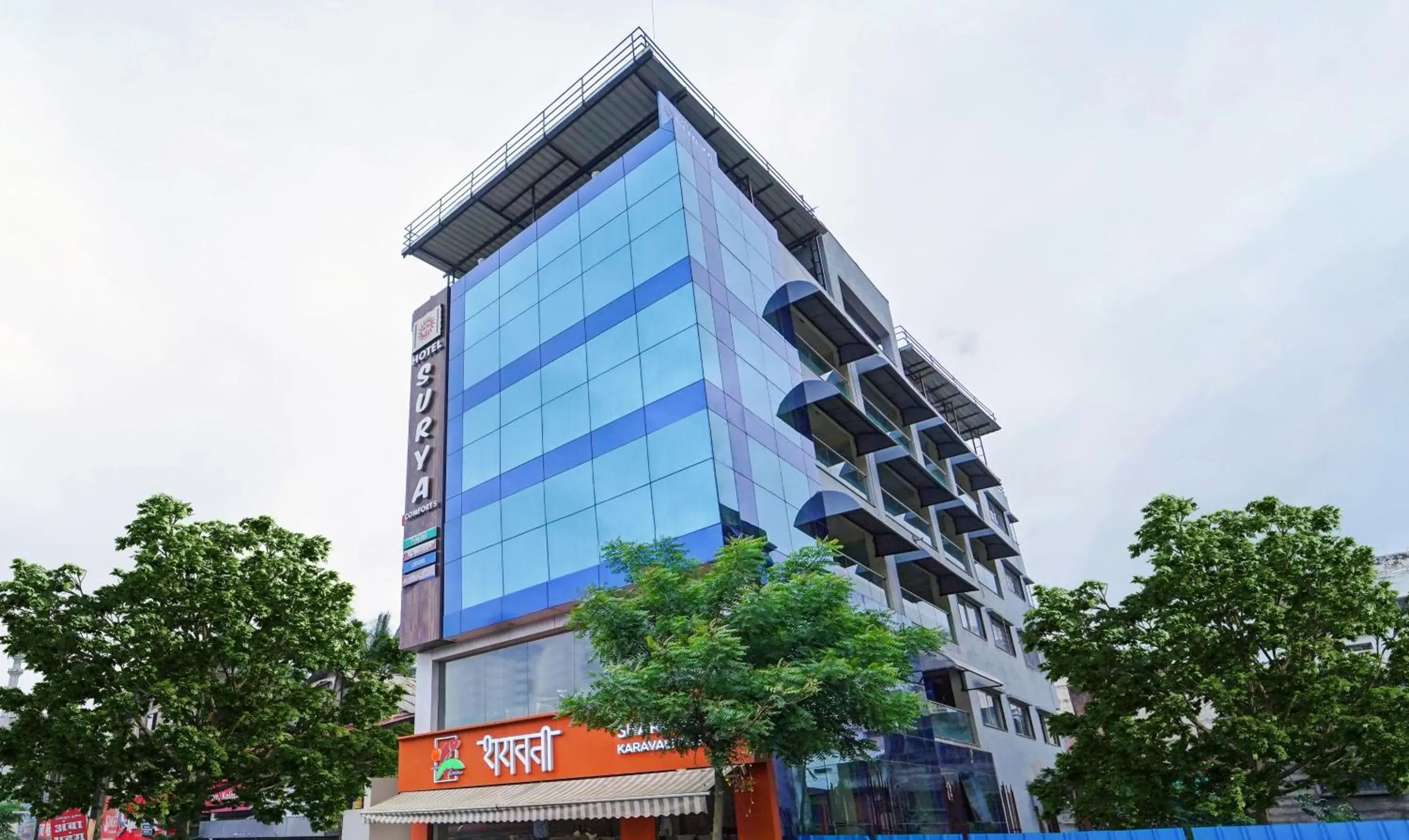 Property building in Treebo Surya Comforts, 200 Mtrs From Kolhapur Railway Station Property building in Treebo Surya Comforts, 200 Mtrs From Kolhapur Railway Station