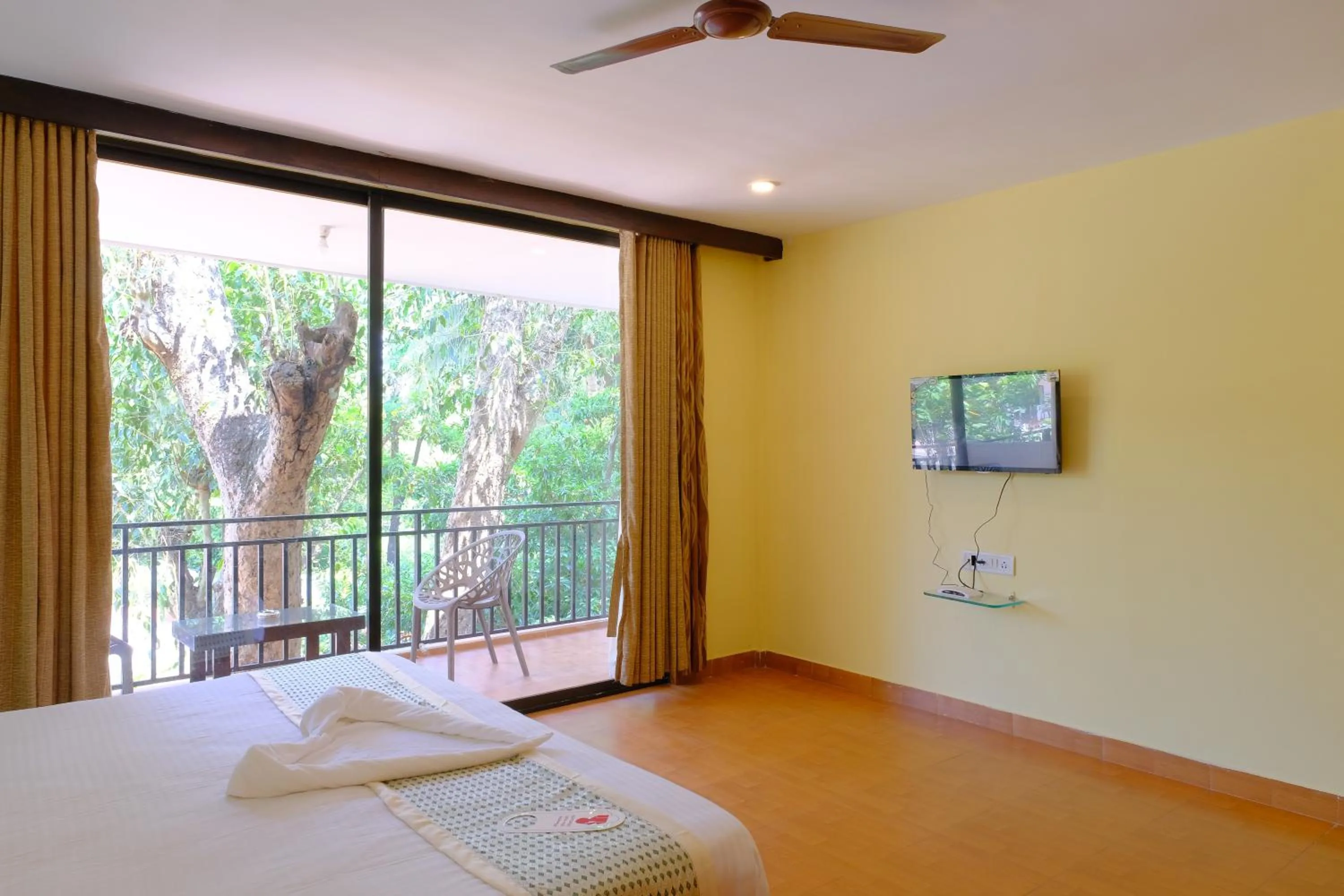 Garden view, Bed in The Byke Royal Pearl Anjuna